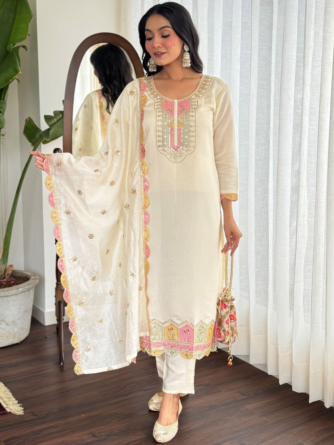 KALINI Floral Embroidered Sequinned Chanderi Silk Kurta with Trousers & Dupatta, Off white
KALINI Floral Embroidered Sequinned Chanderi Silk Kurta with Trousers & Dupatta, Off white