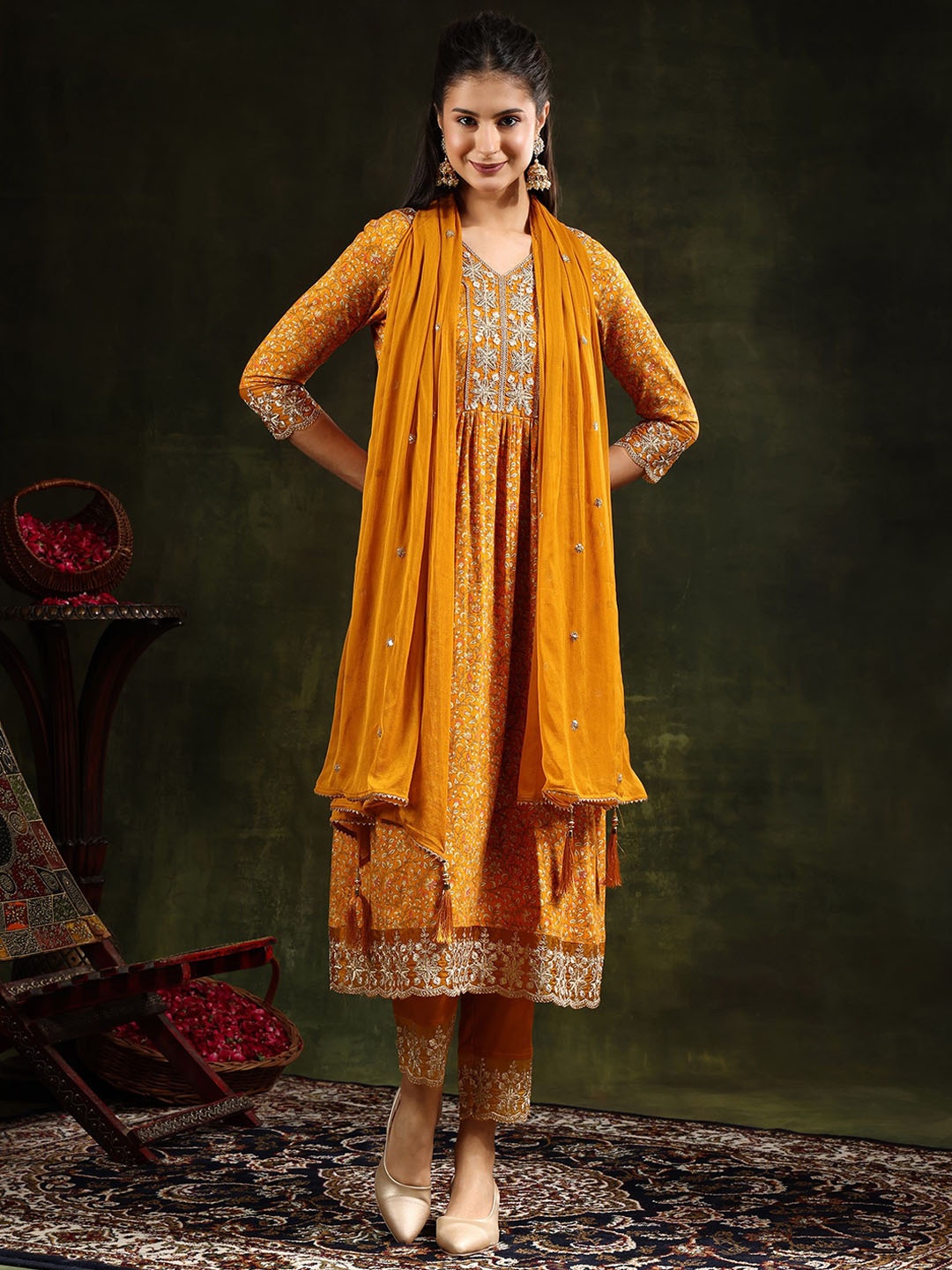 KALINI Women Floral Embroidered Panelled Thread Work Kurta with Trousers & With Dupatta, Mustard
KALINI Women Floral Embroidered Panelled Thread Work Kurta with Trousers & With Dupatta, Mustard