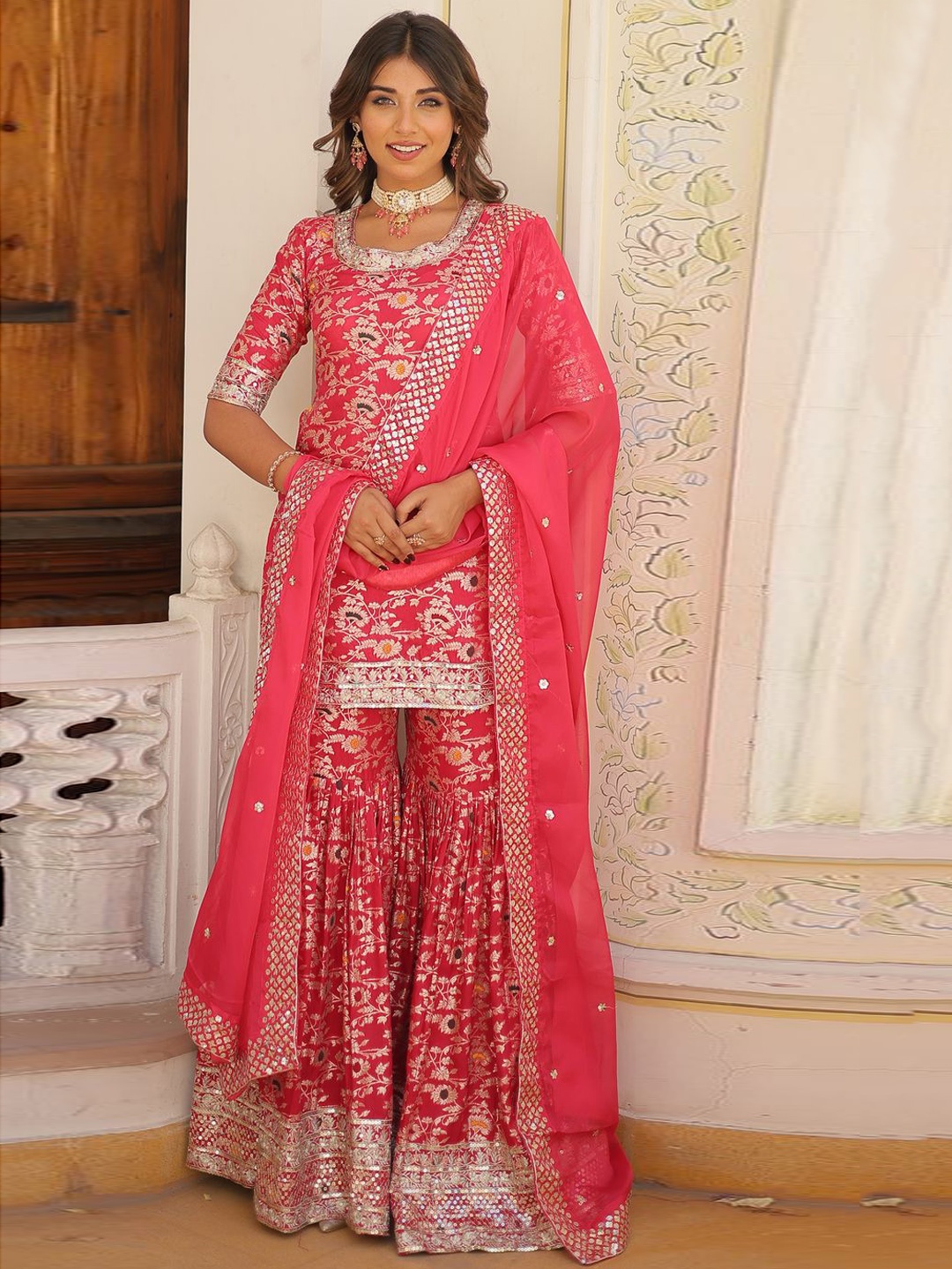 KALINI Women Ethnic Motifs Embroidered Regular Kurti with Sharara & With Dupatta, Pink
KALINI Women Ethnic Motifs Embroidered Regular Kurti with Sharara & With Dupatta, Pink