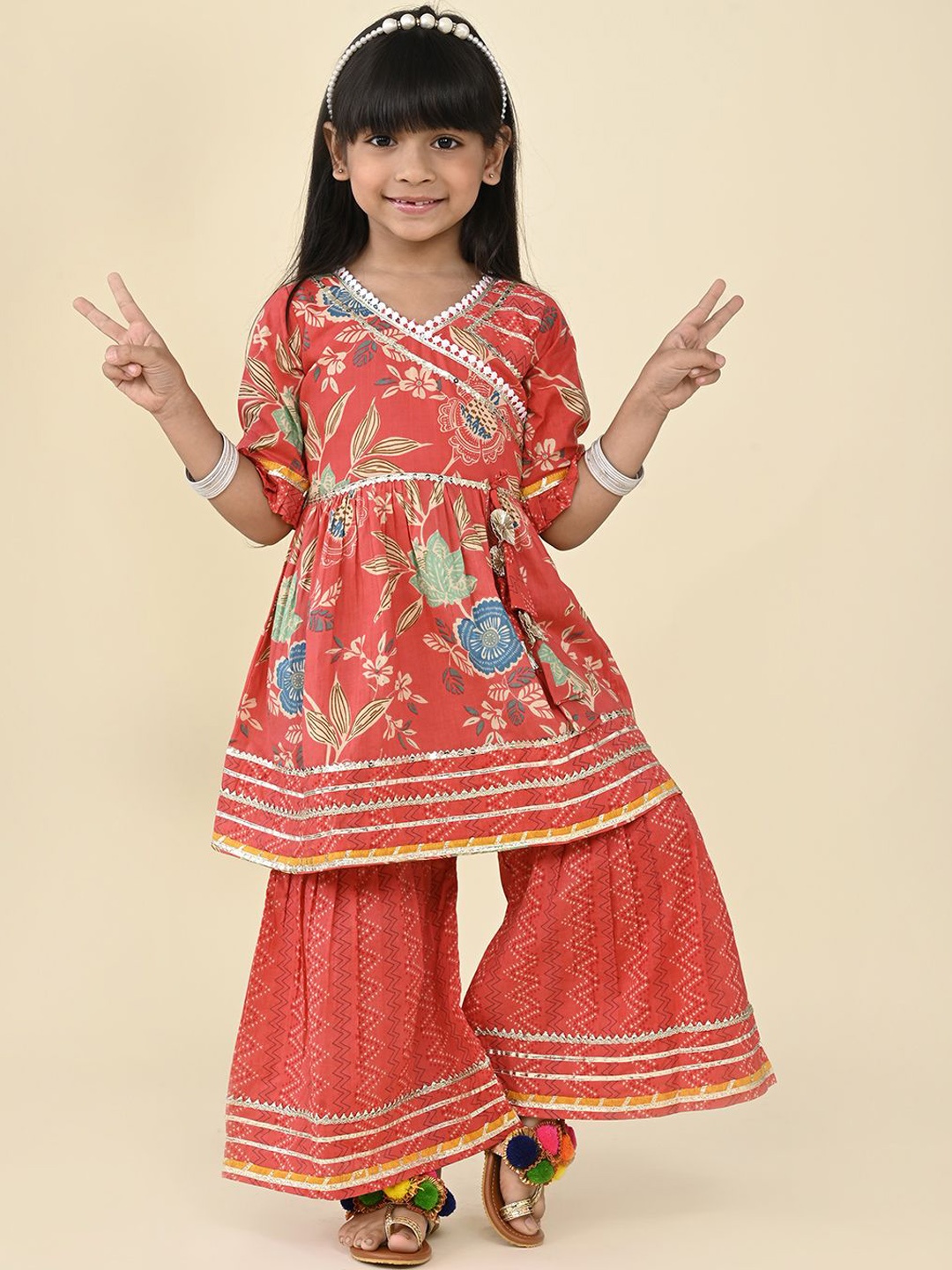 LIL PITAARA Girls Floral Printed V-Neck Angrakha Gotta Patti Pure Cotton Kurta & Sharara, Red
LIL PITAARA Girls Floral Printed V-Neck Angrakha Gotta Patti Pure Cotton Kurta & Sharara, Red