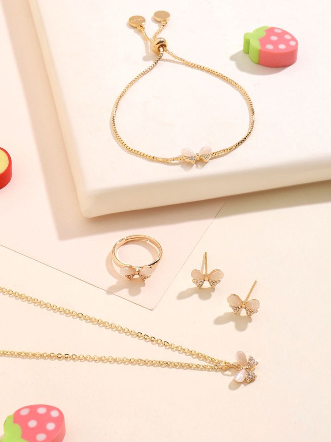 SALTY Gold-Plated Stone-Studded Baby Breeze Necklace and Earrings With Bracelet & Ring
SALTY Gold-Plated Stone-Studded Baby Breeze Necklace and Earrings With Bracelet & Ring