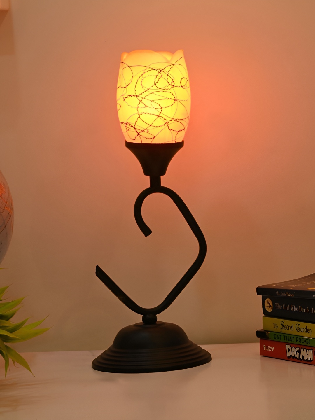 Afast Orange & Black Printed Traditional Cylindrical Glass Table Lamp With Adjustable Cord
Afast Orange & Black Printed Traditional Cylindrical Glass Table Lamp With Adjustable Cord