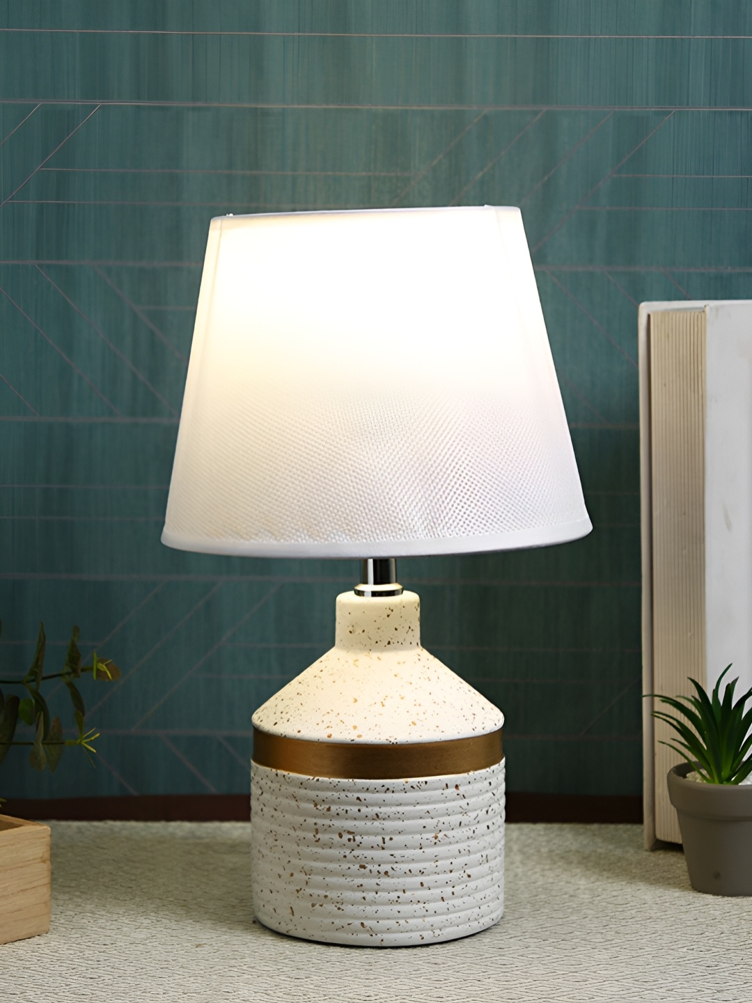 TAYHAA White & Gold-toned Printed Ceramic Contemporary Frusturical Shaped Table Lamp
TAYHAA White & Gold-toned Printed Ceramic Contemporary Frusturical Shaped Table Lamp