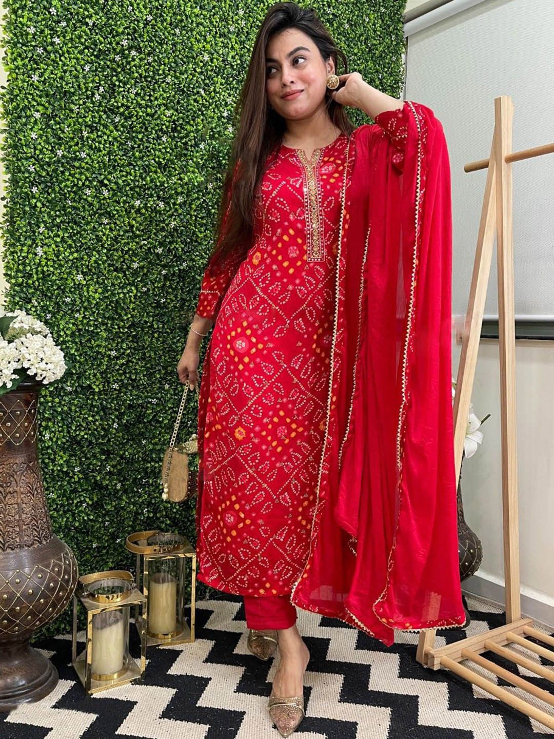 Anni Designer Bandhani Printed Notch Neck Straight Kurta with Trousers & Dupatta, Red
Anni Designer Bandhani Printed Notch Neck Straight Kurta with Trousers & Dupatta, Red