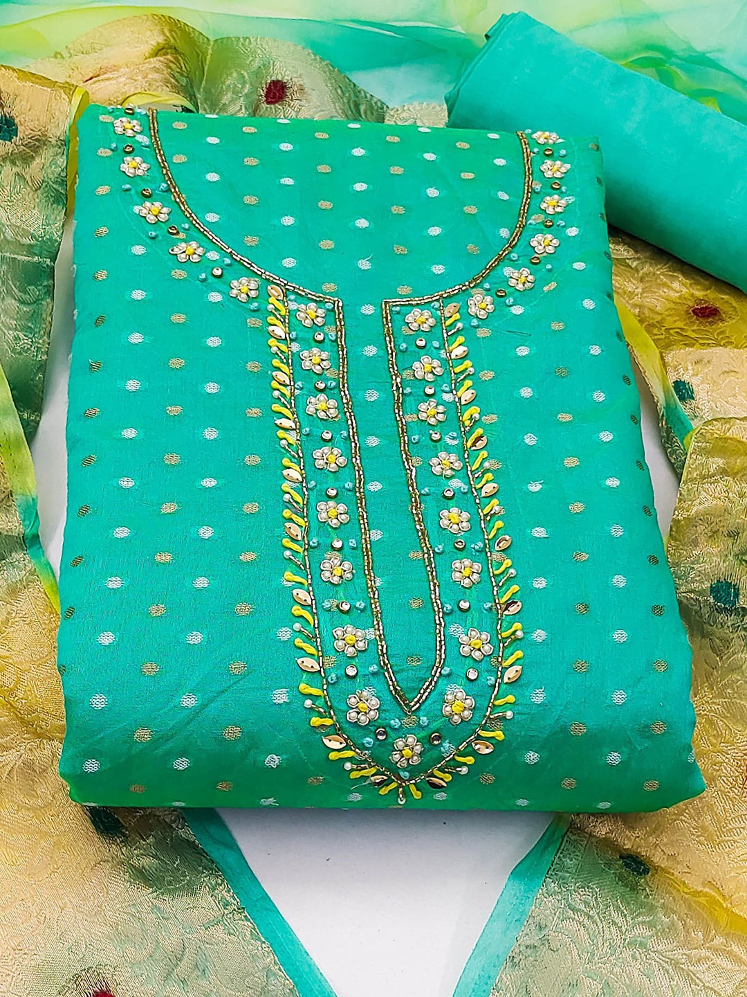Ishin Ethnic Motifs Embroidered Beads and Stones Unstitched Dress Material, Sea green
Ishin Ethnic Motifs Embroidered Beads and Stones Unstitched Dress Material, Sea green