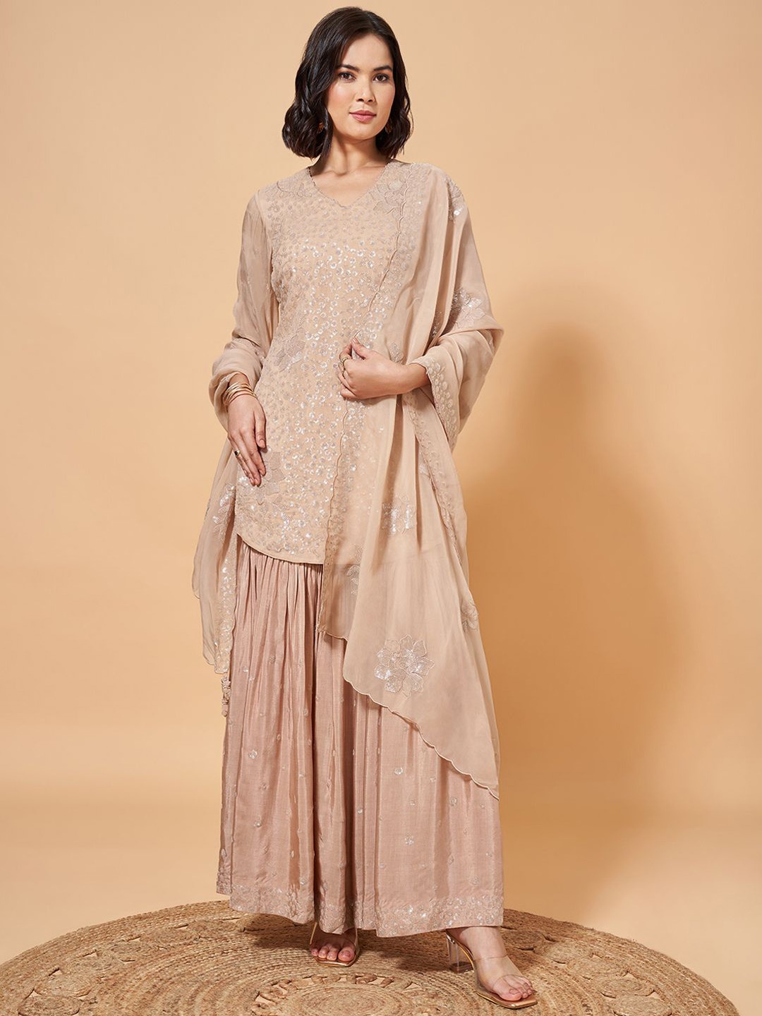 Marigold Lane Embroidered Sequinned V-Neck A-Line Kurti With Sharara & Dupatta, Peach
Marigold Lane Embroidered Sequinned V-Neck A-Line Kurti With Sharara & Dupatta, Peach