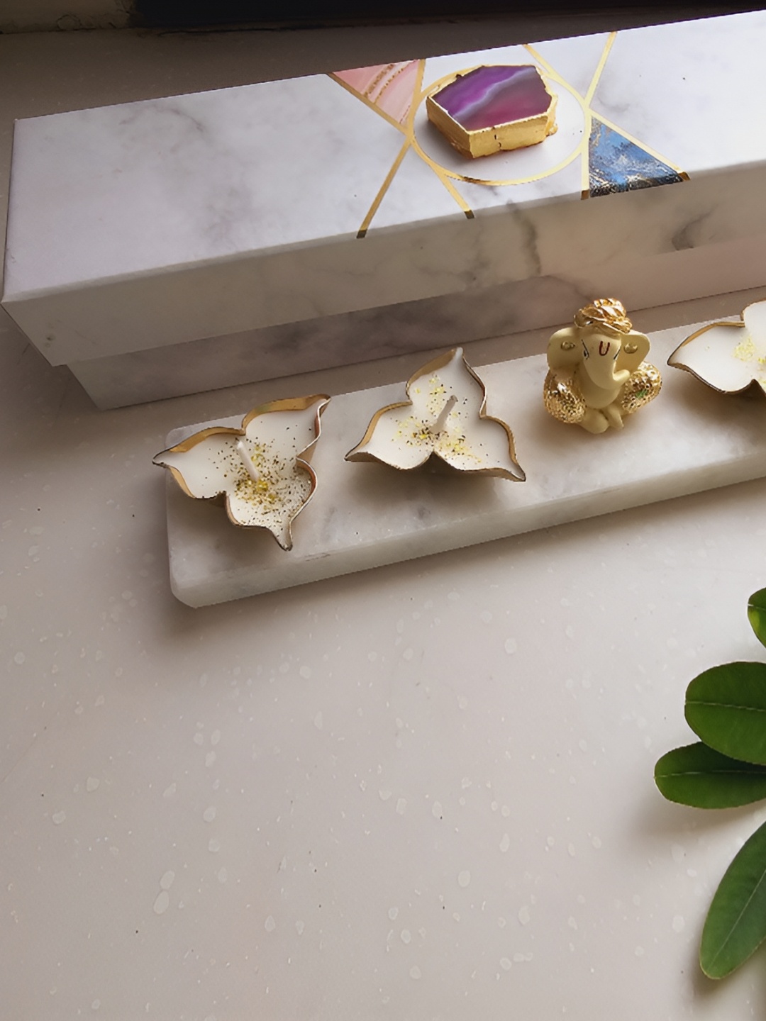 HOMEARTE Off White Ganesha with Marble and metal votive candle Religious Candle Holder
HOMEARTE Off White Ganesha with Marble and metal votive candle Religious Candle Holder