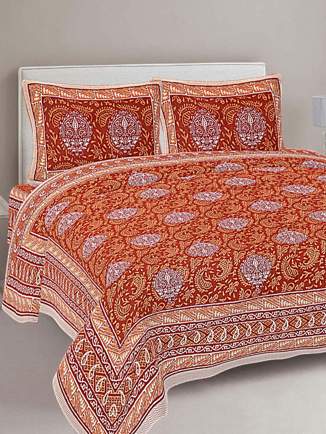 FrionKandy Living Maroon & Orange Printed Cotton 180 TC King Bedsheet With 2 Pillow Covers 
FrionKandy Living Maroon & Orange Printed Cotton 180 TC King Bedsheet With 2 Pillow Covers