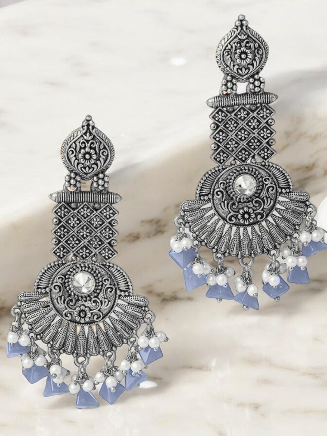 Sangria Artificial Stones and Beads Floral Shaped Oxidised Jhumka Earrings, Blue
Sangria Artificial Stones and Beads Floral Shaped Oxidised Jhumka Earrings, Blue