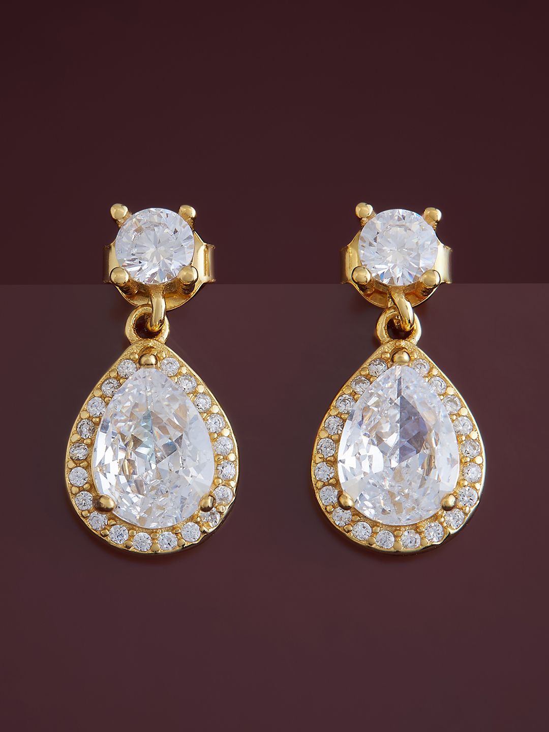 Kushal's Fashion Jewellery 92.5 Pure Silver Gold-Plated Cubic Zirconia Drop Earrings
Kushal's Fashion Jewellery 92.5 Pure Silver Gold-Plated Cubic Zirconia Drop Earrings