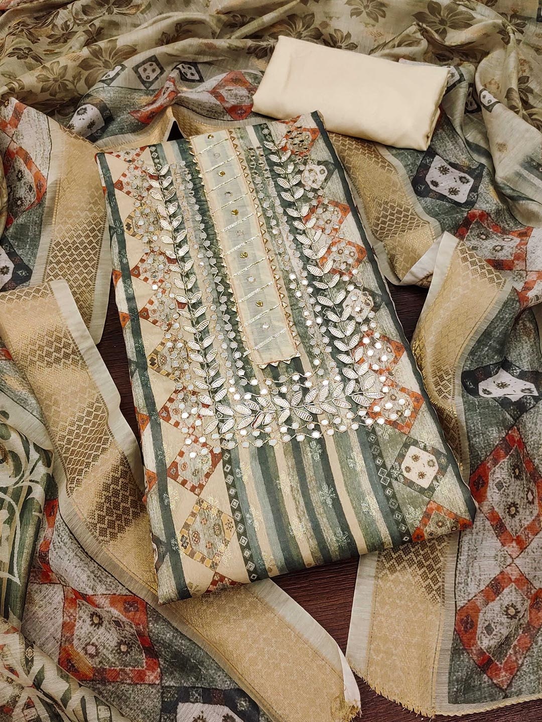 Maroosh Ethnic Motifs Woven Design Mirror Work Banarasi Jacquard Unstitched Dress Material, Beige
Maroosh Ethnic Motifs Woven Design Mirror Work Banarasi Jacquard Unstitched Dress Material, Beige