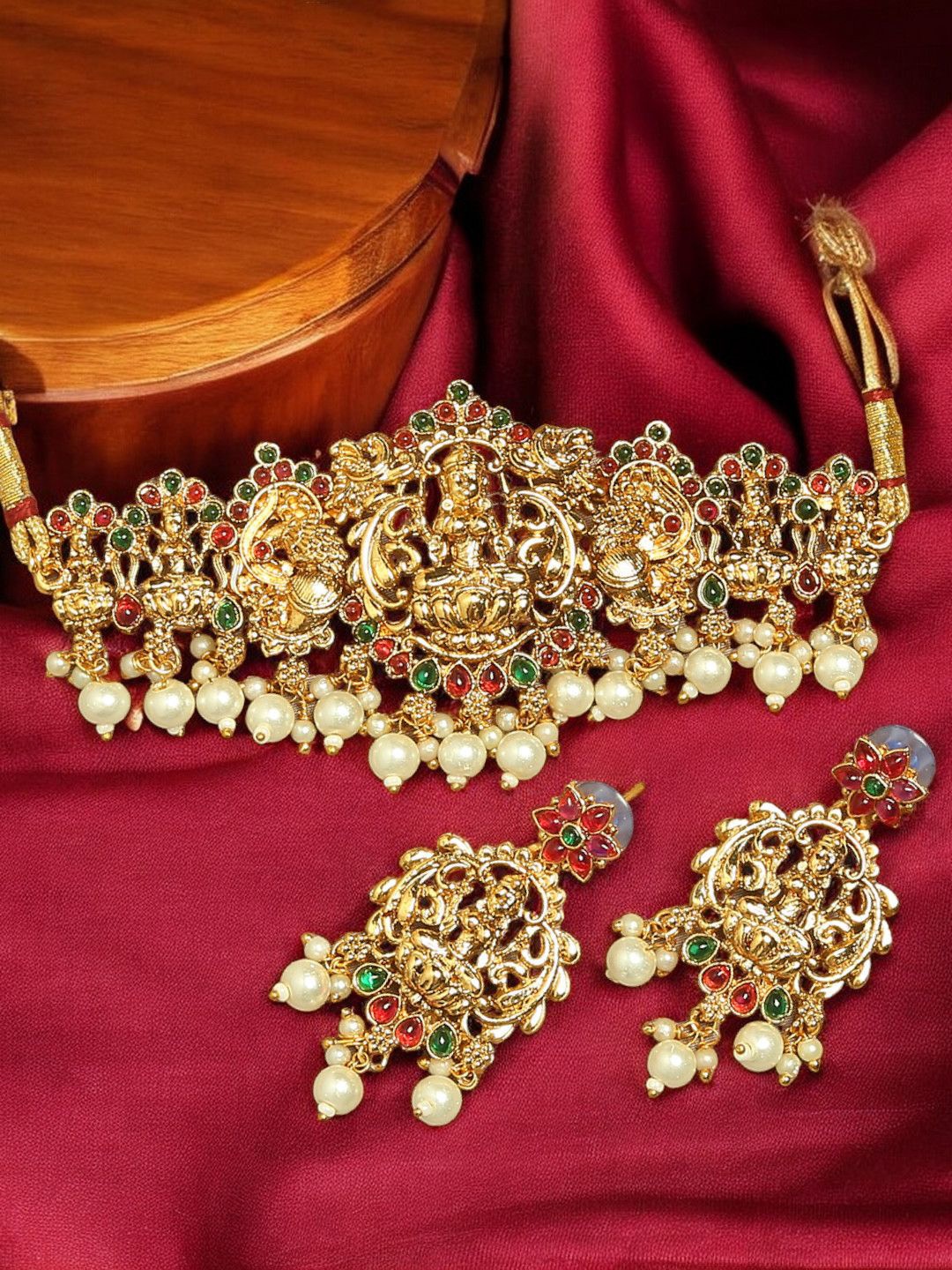 Anouk Stones-Studded & Pearls Beaded Laxmi & Peacock Design Choker Jewellery Set, Red
Anouk Stones-Studded & Pearls Beaded Laxmi & Peacock Design Choker Jewellery Set, Red