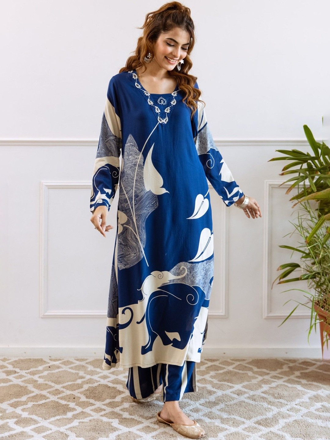 AUTUMN LANE Floral Printed Beads and Stones Pure Cotton Straight Kurta With Palazzo, Blue
AUTUMN LANE Floral Printed Beads and Stones Pure Cotton Straight Kurta With Palazzo, Blue