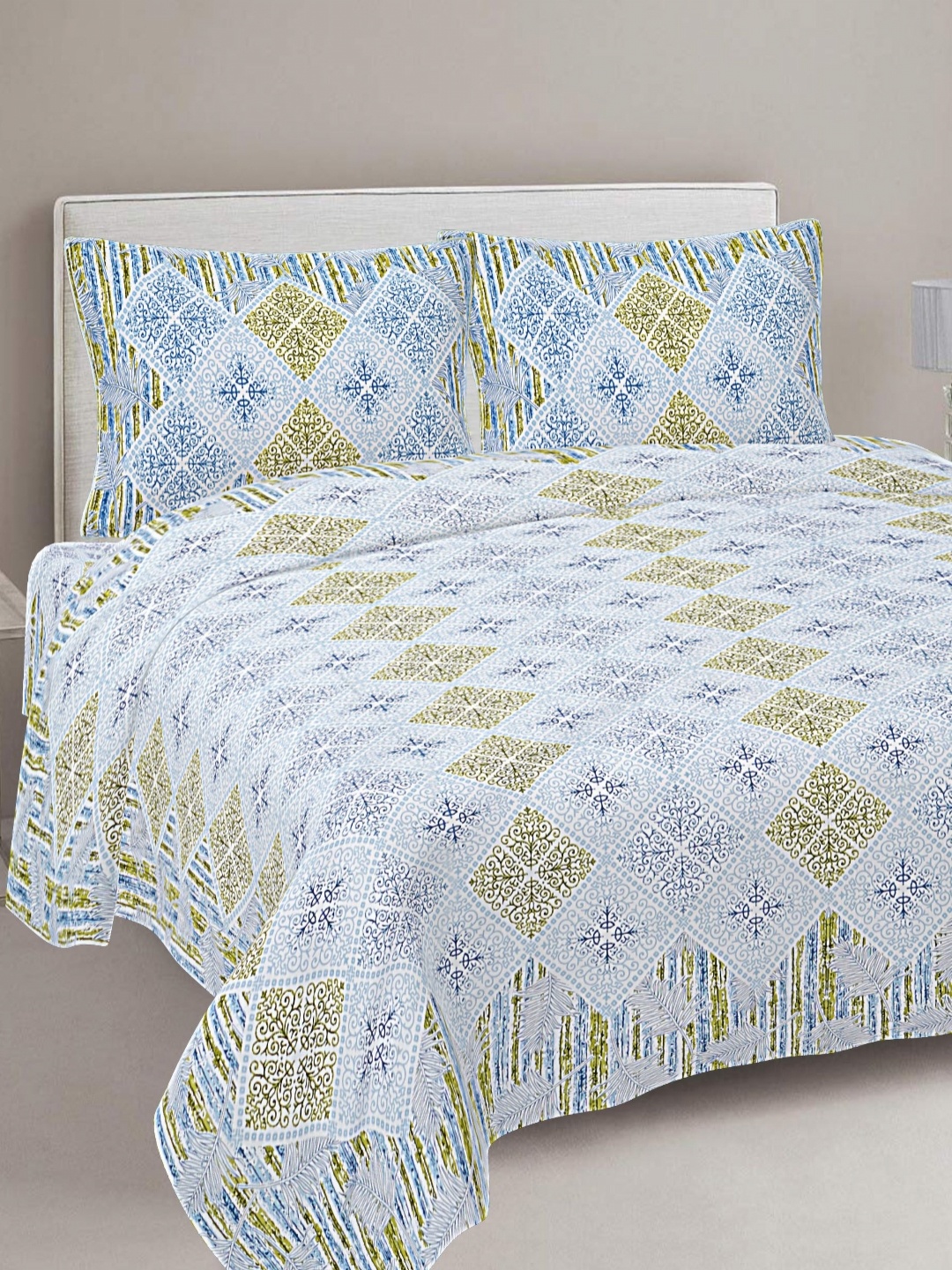 FrionKandy Living Green & Blue Printed Cotton 180 TC King Bedsheet With 2 Pillow Covers
FrionKandy Living Green & Blue Printed Cotton 180 TC King Bedsheet With 2 Pillow Covers