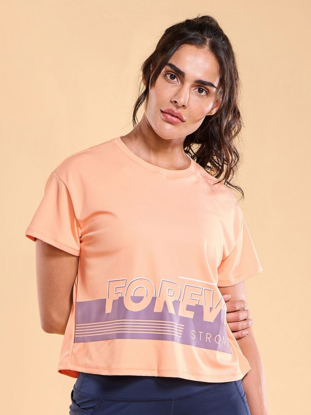 Enamor Typographic Printed Drop Shoulder Sleeves Relaxed Fit Crop T-shirt A311, Peach
Enamor Typographic Printed Drop Shoulder Sleeves Relaxed Fit Crop T-shirt A311, Peach