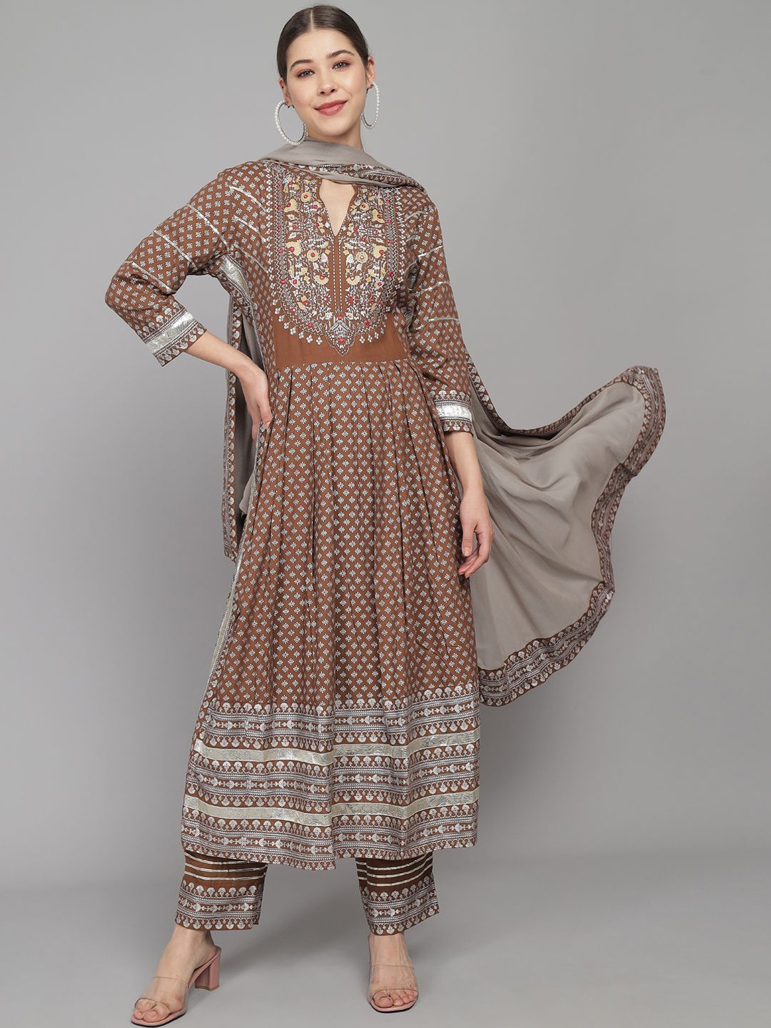 IndigoFerry Women Floral Embroidered Regular Kurta with Trousers & With Dupatta, Brown
IndigoFerry Women Floral Embroidered Regular Kurta with Trousers & With Dupatta, Brown