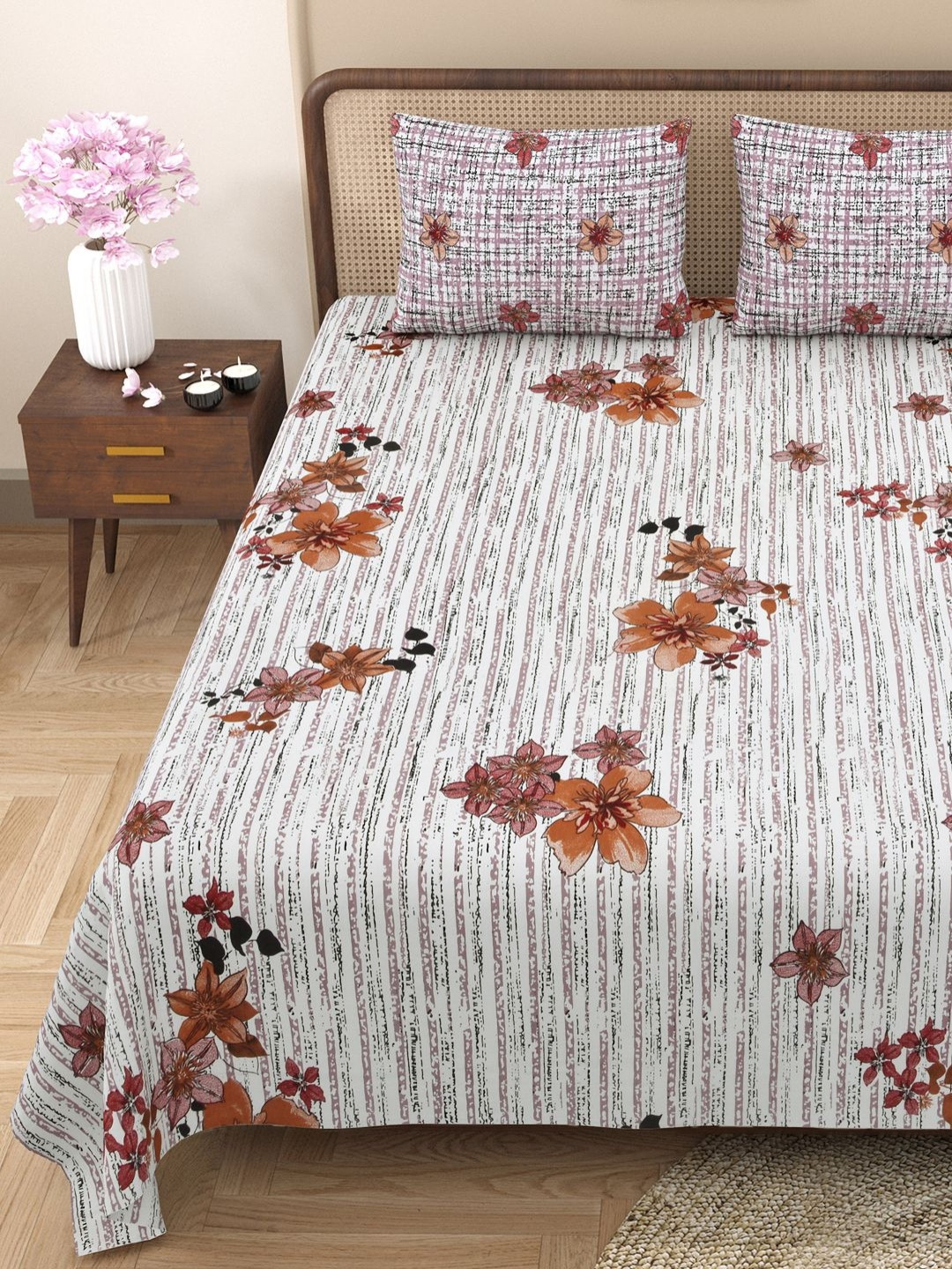 Aura Purple & White Bella Casa Floral 180TC Cotton Queen Double Bedsheet & 2 Pillow Covers
Aura Purple & White Bella Casa Floral 180TC Cotton Queen Double Bedsheet & 2 Pillow Covers