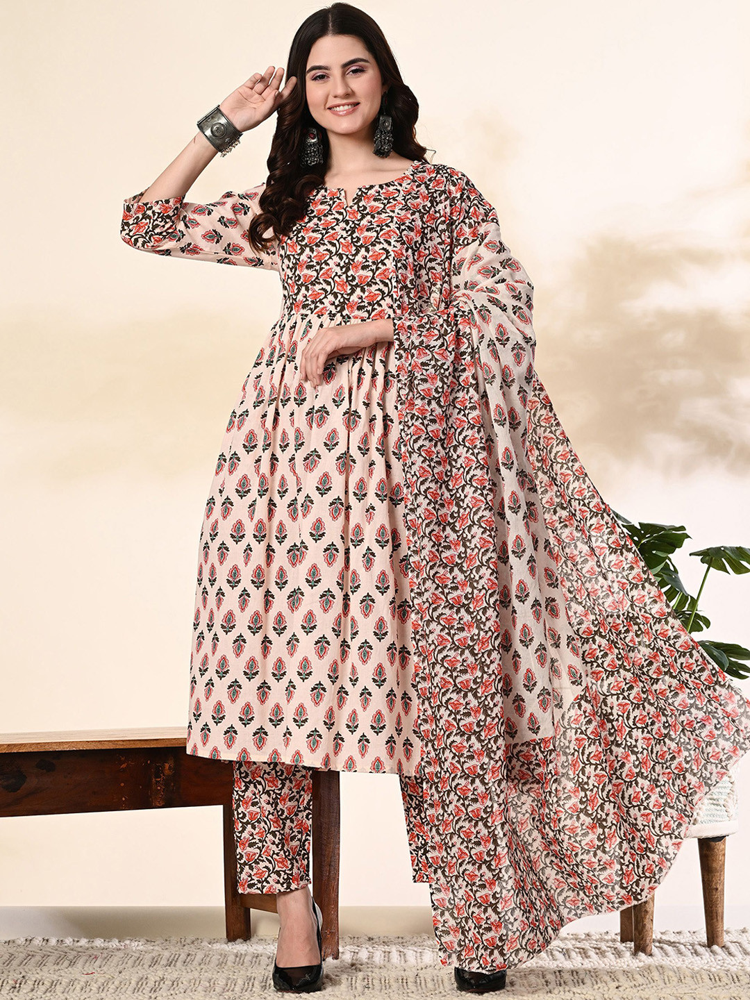 KALINI Floral Printed Notched Neck Pure Cotton A-Line Kurta With Trousers & Dupatta, Peach
KALINI Floral Printed Notched Neck Pure Cotton A-Line Kurta With Trousers & Dupatta, Peach