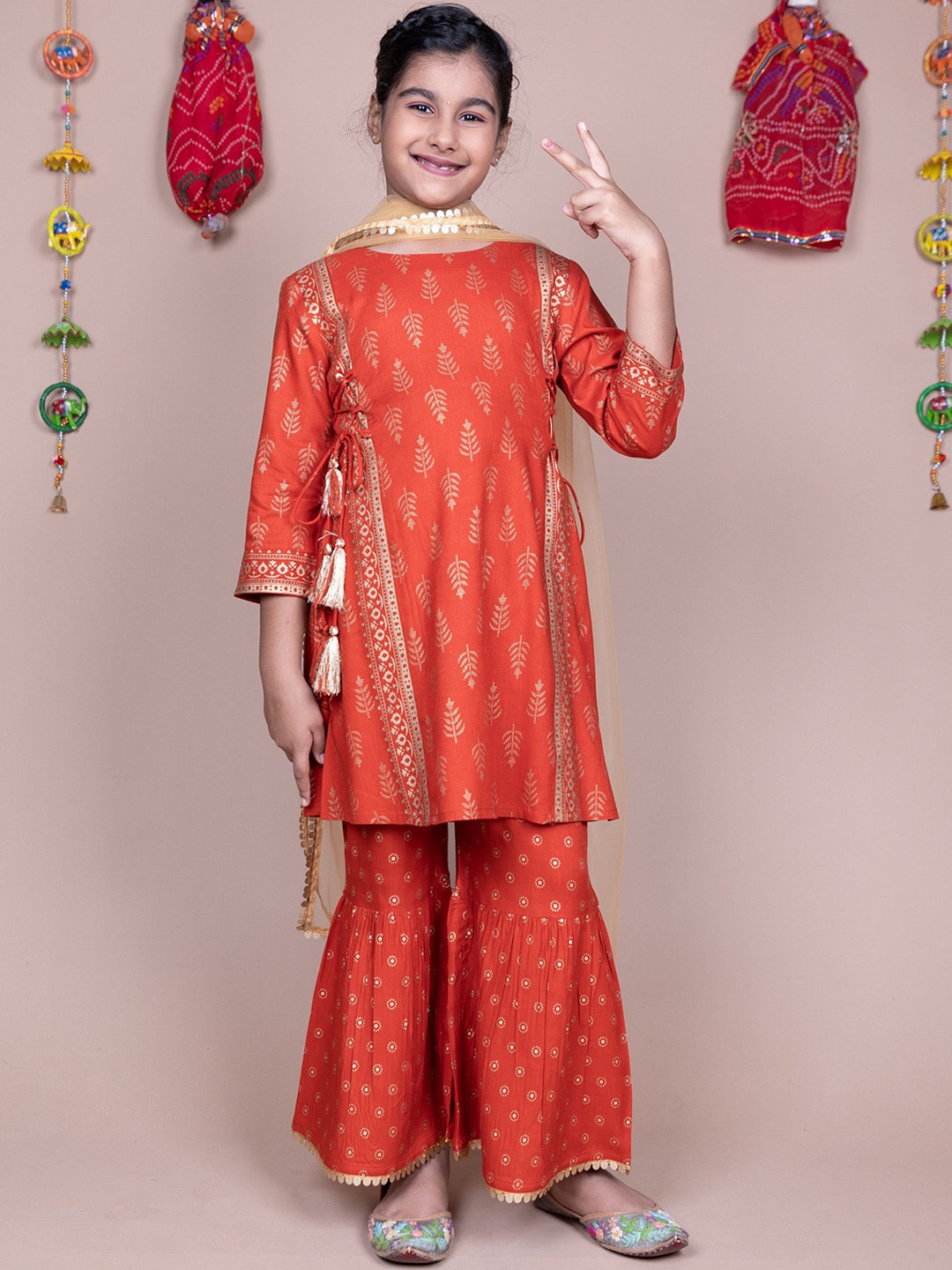 KASYA Girls Ethnic Motifs Printed Regular Kurta with Sharara & With Dupatta, Rust
KASYA Girls Ethnic Motifs Printed Regular Kurta with Sharara & With Dupatta, Rust
