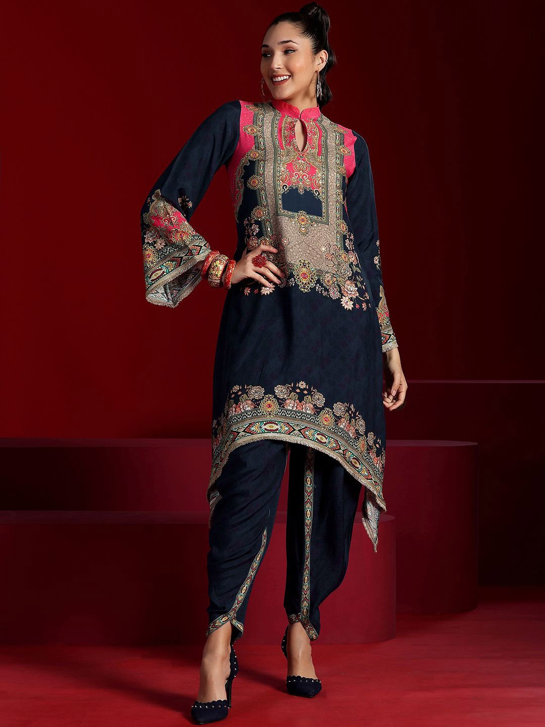 Libas Art Ethnic Motifs Printed Mandarin Sequinned Tunic with Dhoti Pants, Navy blue
Libas Art Ethnic Motifs Printed Mandarin Sequinned Tunic with Dhoti Pants, Navy blue