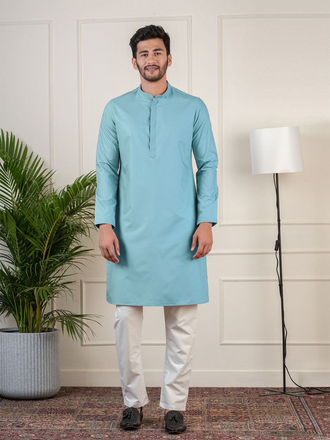 TheEthnic.Co Mandarin Collar Thread Work Regular Pure Cotton Kurta with Pyjamas, Teal
TheEthnic.Co Mandarin Collar Thread Work Regular Pure Cotton Kurta with Pyjamas, Teal