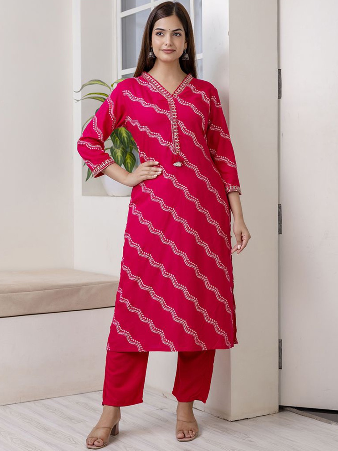 Veshviti Leheriya Printed Embroidered V-Neck Sequinned Straight Kurta With Trousers, Pink
Veshviti Leheriya Printed Embroidered V-Neck Sequinned Straight Kurta With Trousers, Pink