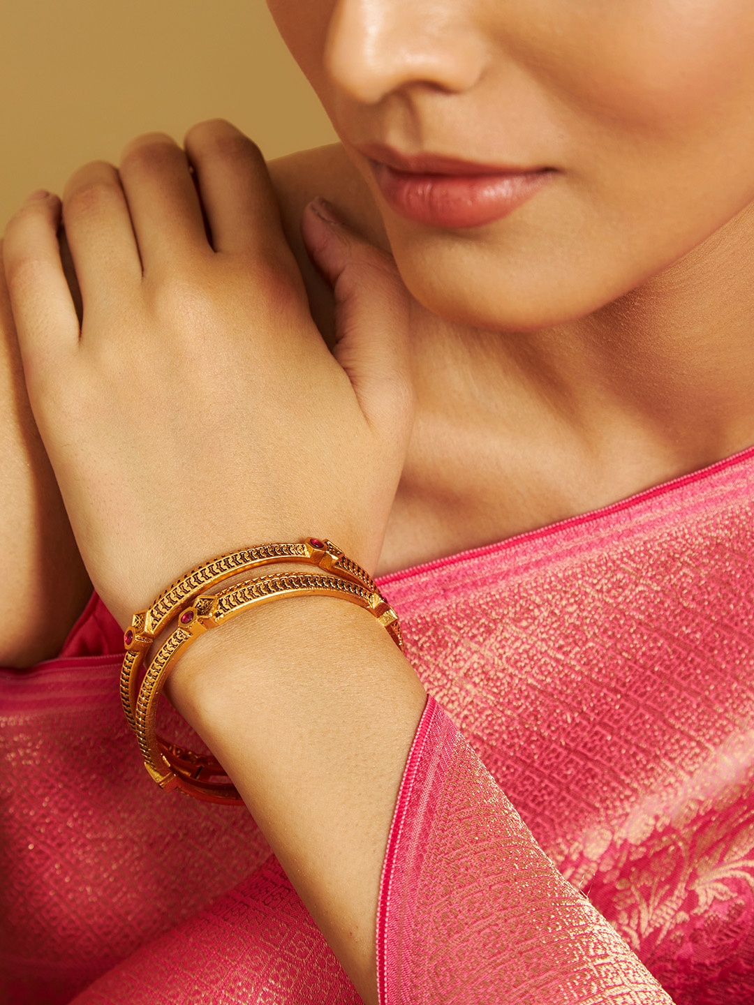 Kushal's Fashion Jewellery Set of 2 Gold Plated Artificial Stones Studded Antique Bangles
Kushal's Fashion Jewellery Set of 2 Gold Plated Artificial Stones Studded Antique Bangles