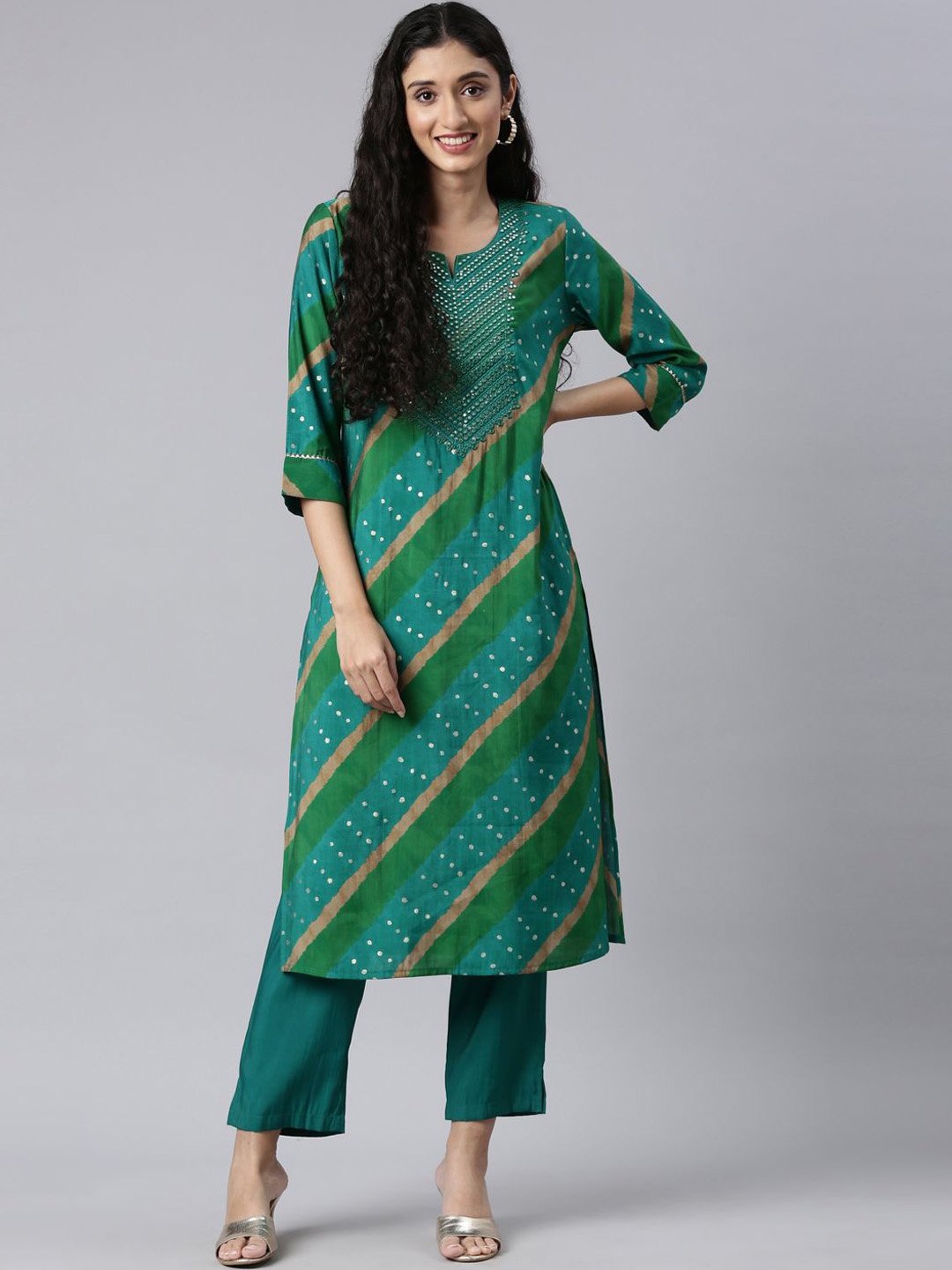 Neerus Women Leheriya Printed Panelled Mirror Work Kurta with Trousers, Green
Neerus Women Leheriya Printed Panelled Mirror Work Kurta with Trousers, Green