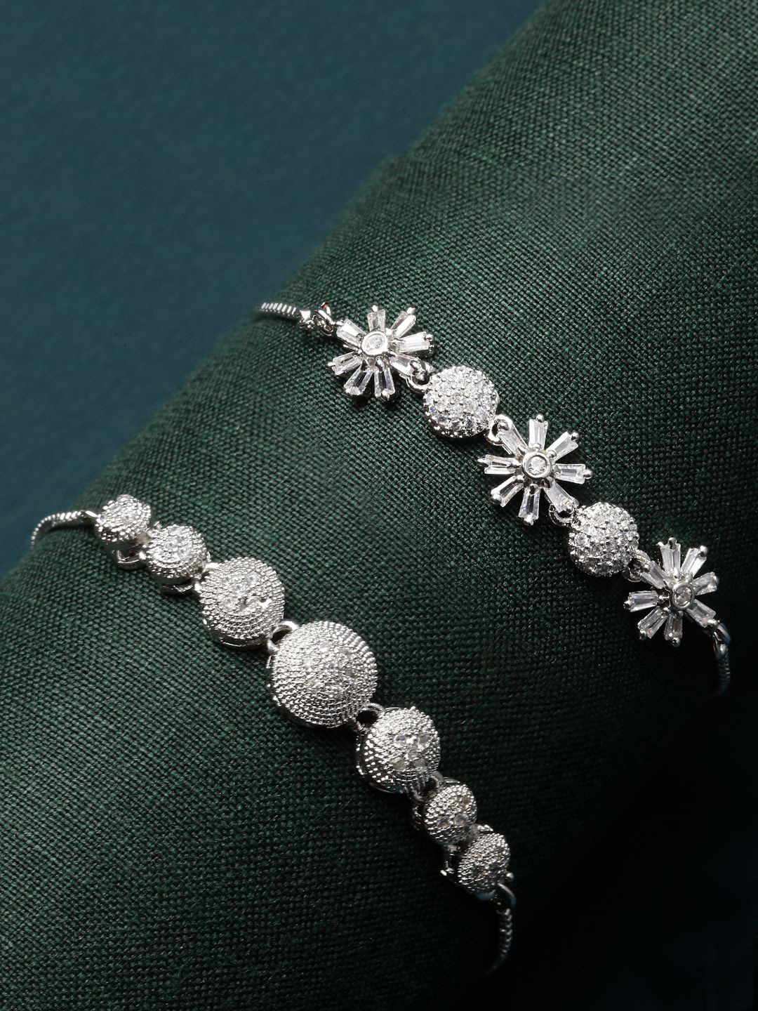 ZENEME Set of 2 Rhodium-Plated American Diamond Studded Wraparound Link Bracelets, Silver
ZENEME Set of 2 Rhodium-Plated American Diamond Studded Wraparound Link Bracelets, Silver