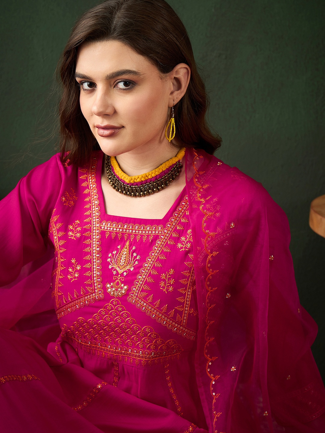 Sangria Magenta Floral Embroidered Square Neck Sequinned Kurta With Trouser With Dupatta
Sangria Magenta Floral Embroidered Square Neck Sequinned Kurta With Trouser With Dupatta