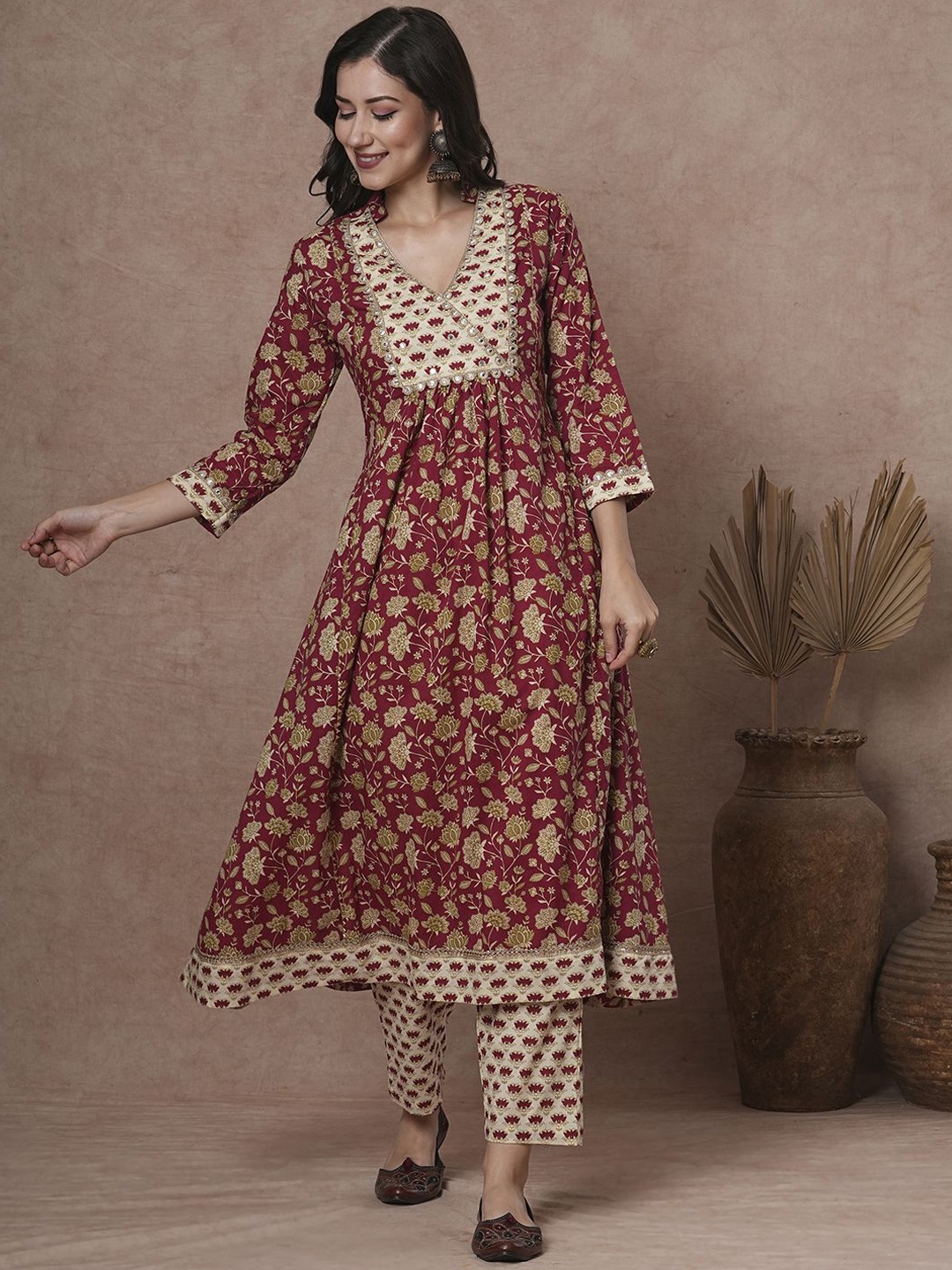 FASHOR Maroon and Cream Floral Printed Mirror Work Pure Cotton A-Line Kurta with Palazzos
FASHOR Maroon and Cream Floral Printed Mirror Work Pure Cotton A-Line Kurta with Palazzos