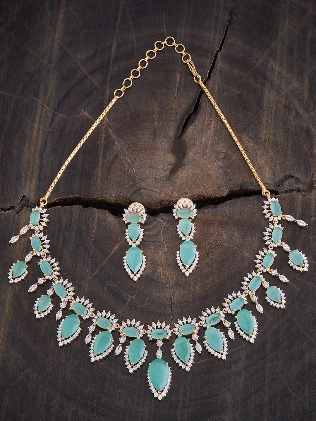 Kushal's Fashion Jewellery Gold Plated CZ Stone Studded Necklace and Earrings
Kushal's Fashion Jewellery Gold Plated CZ Stone Studded Necklace and Earrings