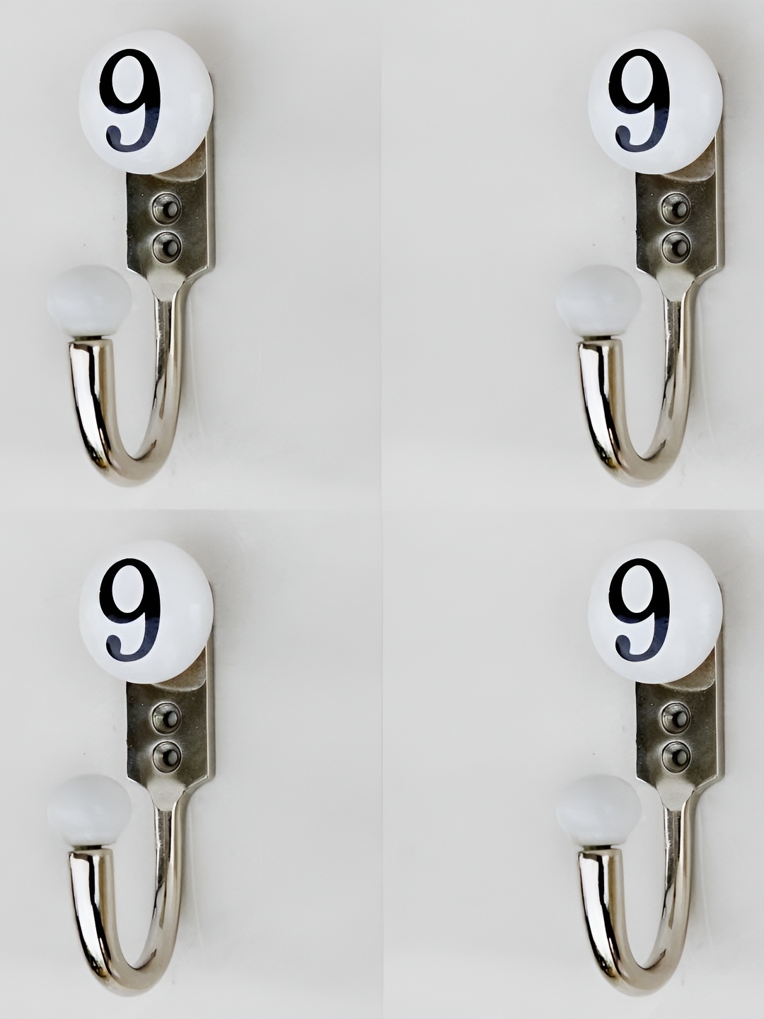 IndianShelf White & Silver Toned 4 Pieces 9 Number Printed Ceramic & Zinc Wall Hooks
IndianShelf White & Silver Toned 4 Pieces 9 Number Printed Ceramic & Zinc Wall Hooks