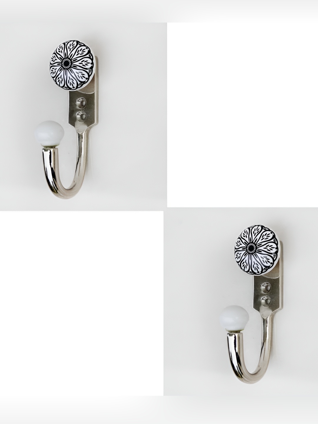 IndianShelf Black & White 2 Pieces Ceramic & Zinc Daisy Wall Hanger Key Hooks
IndianShelf Black & White 2 Pieces Ceramic & Zinc Daisy Wall Hanger Key Hooks