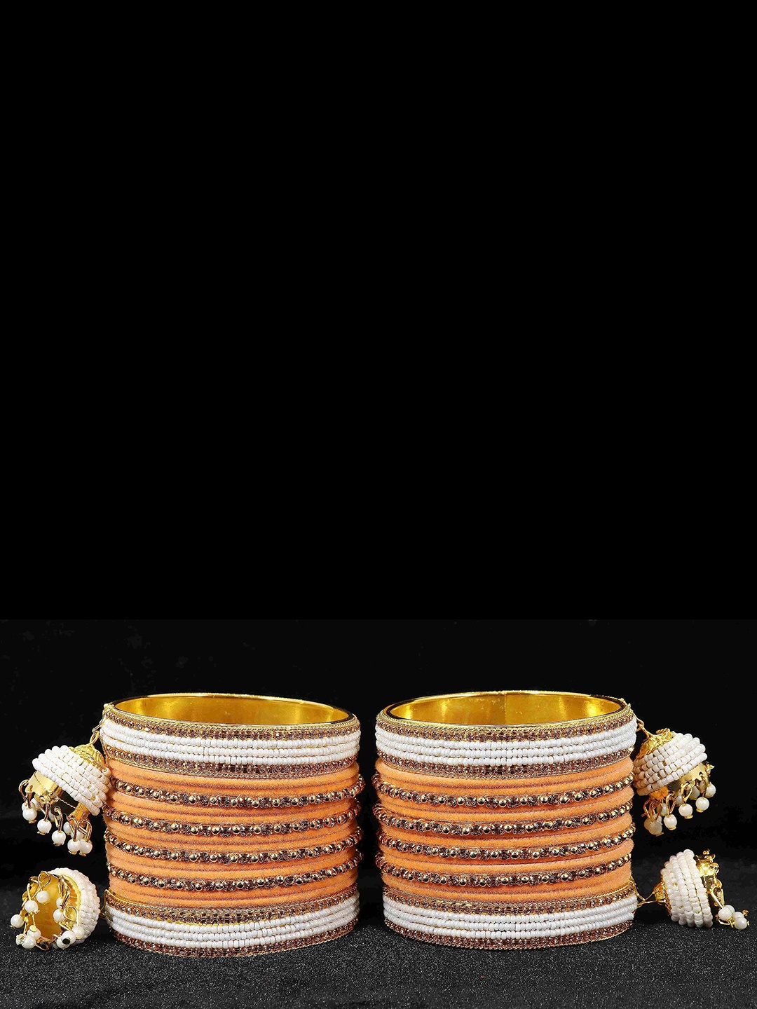 ZULKA Set of 16 Metal with Zircon Gemstone and Velvet Adorned Bells Latkan Bangles, Green
ZULKA Set of 16 Metal with Zircon Gemstone and Velvet Adorned Bells Latkan Bangles, Green