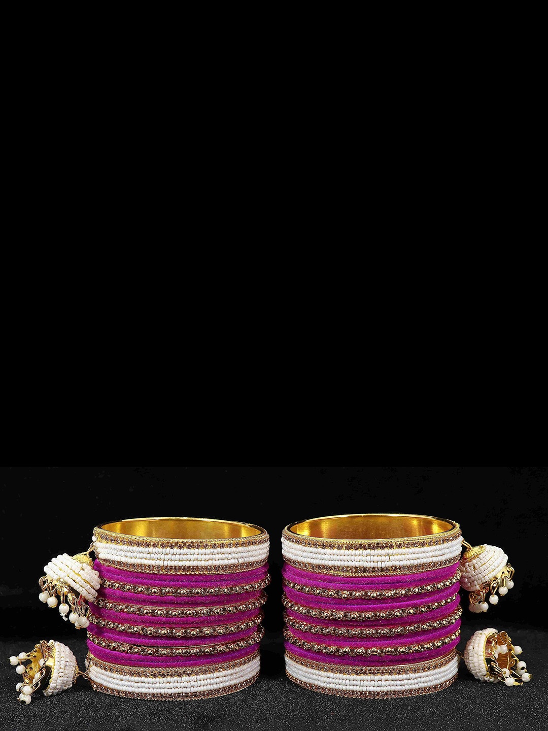 ZULKA Set of 16 Metal with Zircon Gemstone and Velvet Adorned Bells Latkan Bangles, Black
ZULKA Set of 16 Metal with Zircon Gemstone and Velvet Adorned Bells Latkan Bangles, Black