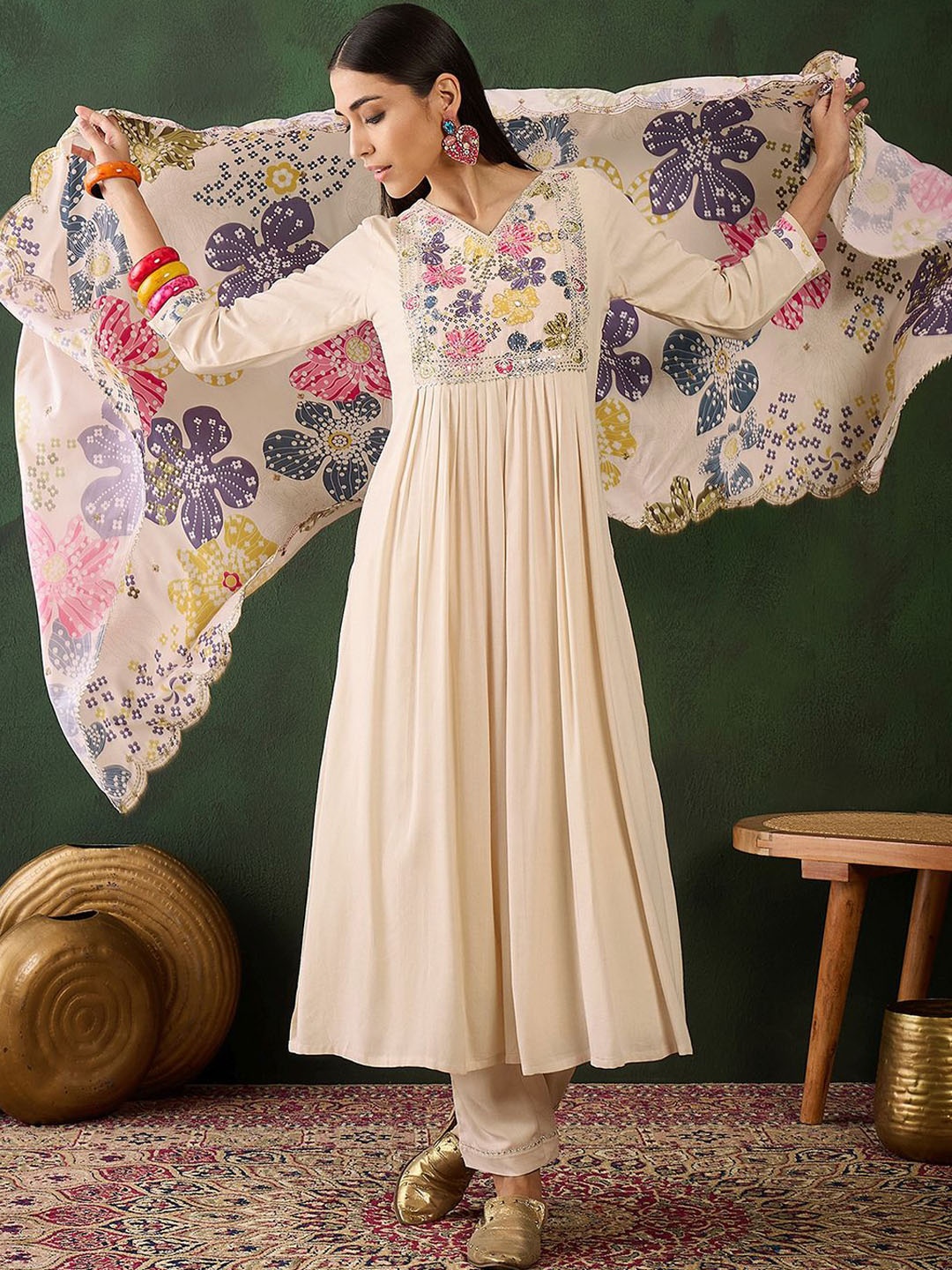 Sangria Off White Floral Embroidered Pleated Styles Sequined Kurta & Trousers with Dupatta
Sangria Off White Floral Embroidered Pleated Styles Sequined Kurta & Trousers with Dupatta