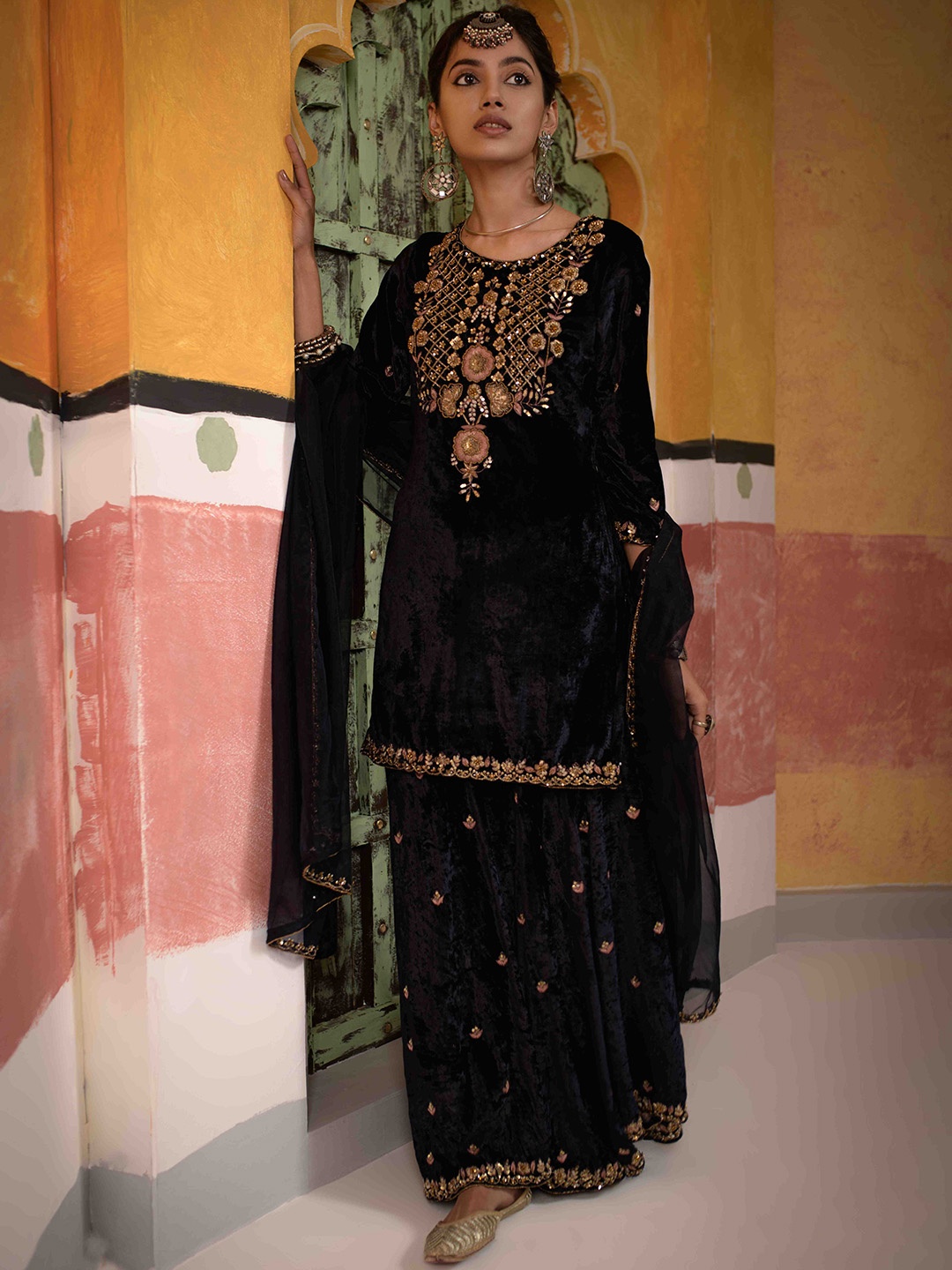 The Front Row Women Floral Embroidered Velvet Kurti with Sharara & With Dupatta, Black
The Front Row Women Floral Embroidered Velvet Kurti with Sharara & With Dupatta, Black