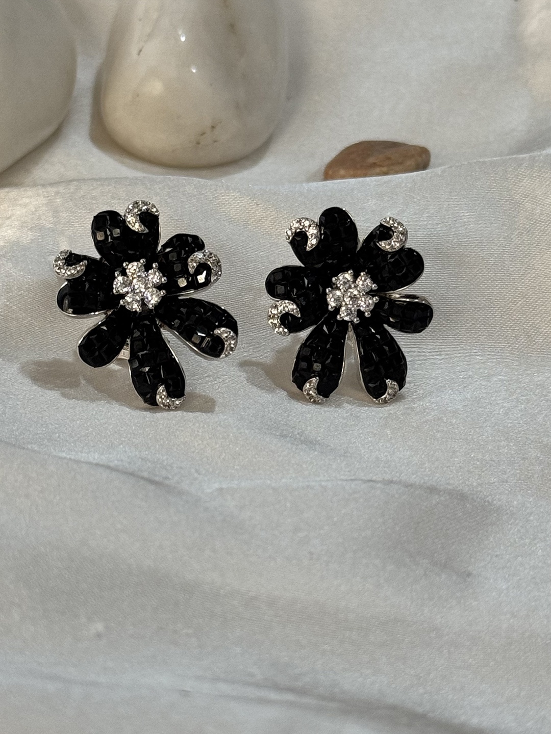 The Jewellery Tale Sliver Plated Artificial Stones Studded Floral Shaped Studs Earrings, Black
The Jewellery Tale Sliver Plated Artificial Stones Studded Floral Shaped Studs Earrings, Black