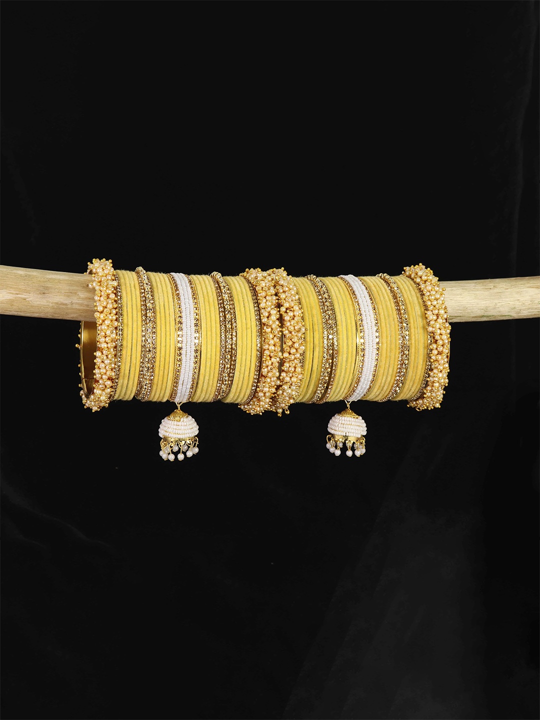 ZULKA Set of 54 Metal With Pearls Zircon & Velvet Bridal Chuda Latkan Bangles, Yellow
ZULKA Set of 54 Metal With Pearls Zircon & Velvet Bridal Chuda Latkan Bangles, Yellow