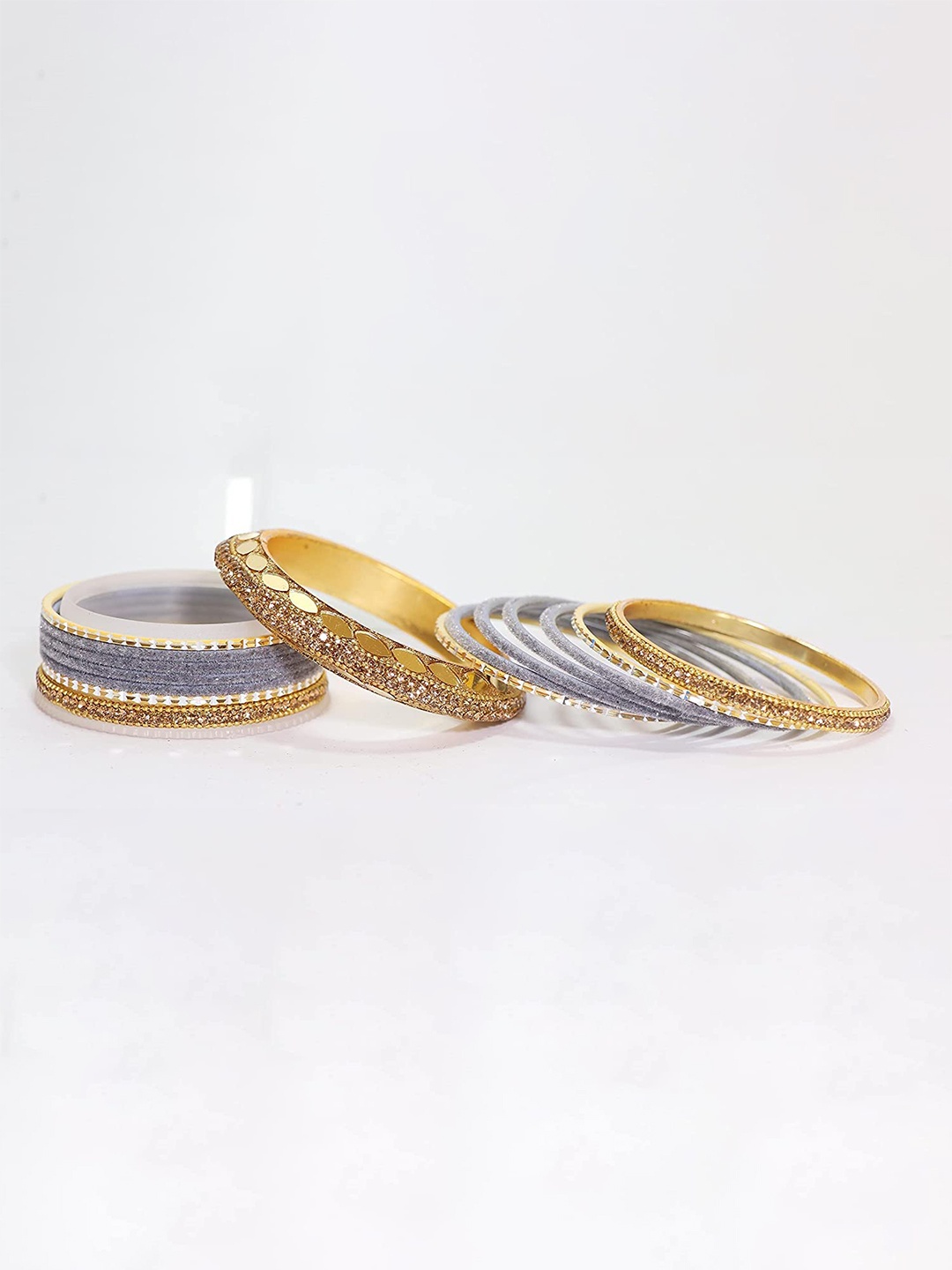 ZULKA Set of 30 Gold-Plated Artificial Stones and Beads Studded Velvet Bangles, Grey
ZULKA Set of 30 Gold-Plated Artificial Stones and Beads Studded Velvet Bangles, Grey