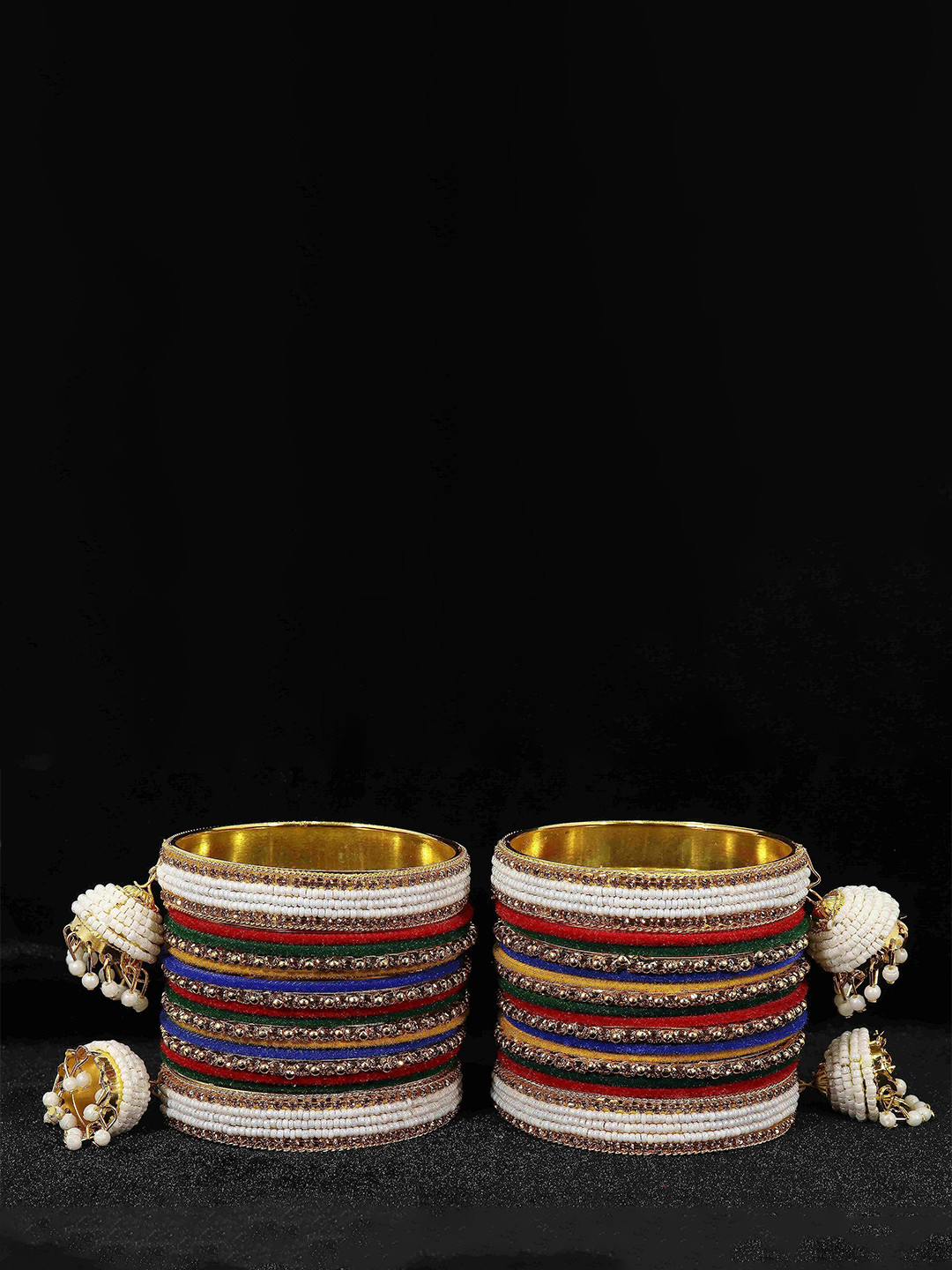 ZULKA Set of 16 Metal with Zircon Gemstone and Velvet Adorned Bells Latkan Bangles, Multi
ZULKA Set of 16 Metal with Zircon Gemstone and Velvet Adorned Bells Latkan Bangles, Multi