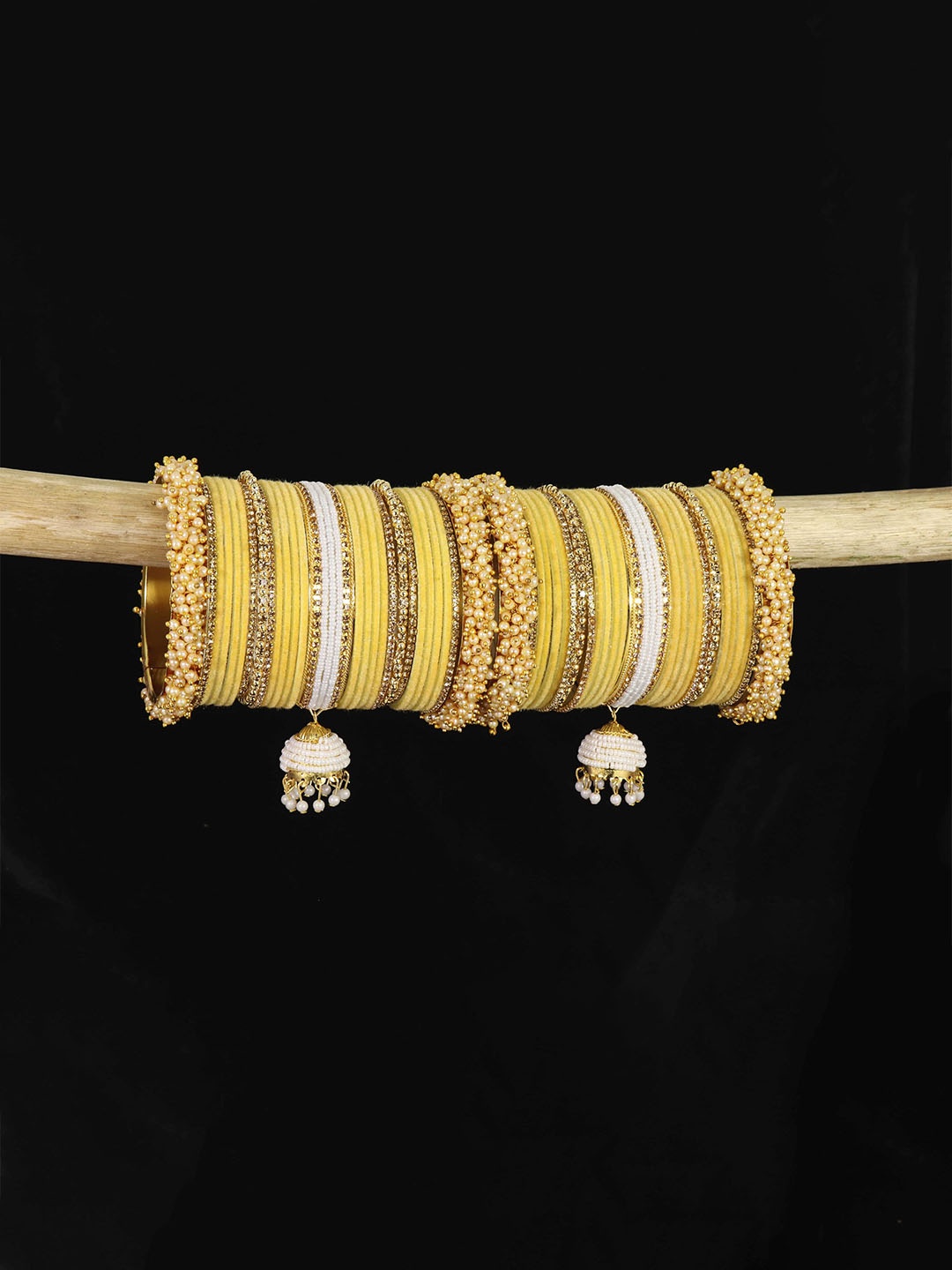 ZULKASet of 54 Artificial Beads Zircon & Velvet Bangles Bridal Chuda with Latkan, Yellow
ZULKASet of 54 Artificial Beads Zircon & Velvet Bangles Bridal Chuda with Latkan, Yellow