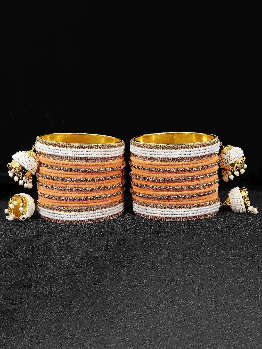 ZULKA Set of 16 Metal with Zircon Gemstone and Velvet Adorned Bells Latkan Bangles, Green
ZULKA Set of 16 Metal with Zircon Gemstone and Velvet Adorned Bells Latkan Bangles, Green