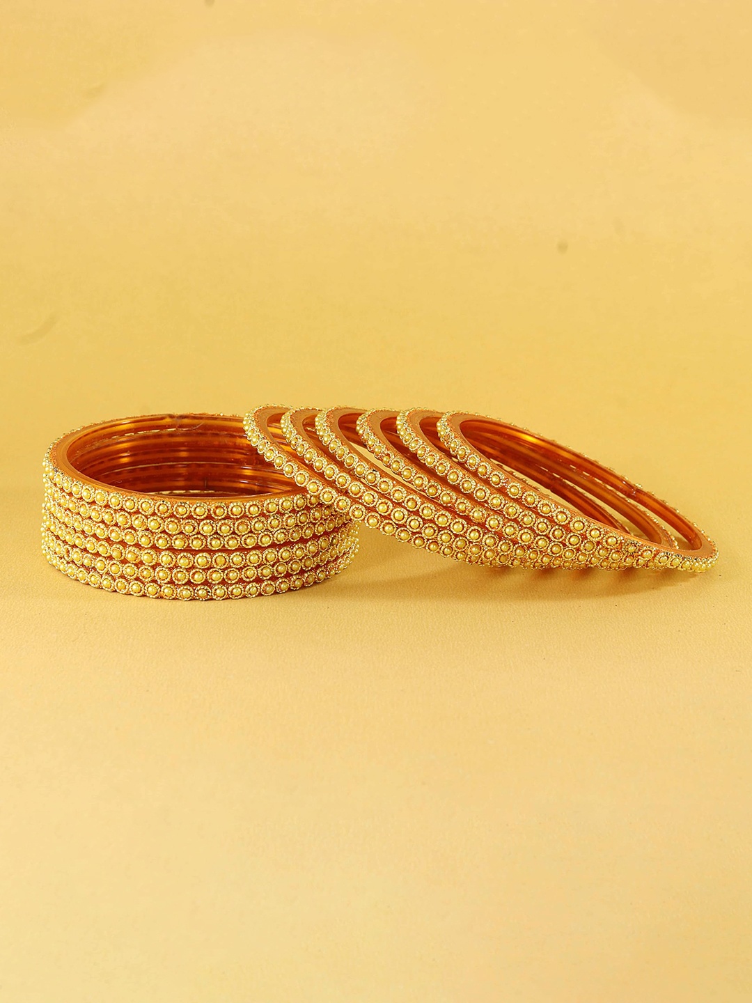 ZULKA Set of 4 Glass with Zircon Gemstone and Beads Studded Glossy Finished Kada Bangles, Gold
ZULKA Set of 4 Glass with Zircon Gemstone and Beads Studded Glossy Finished Kada Bangles, Gold