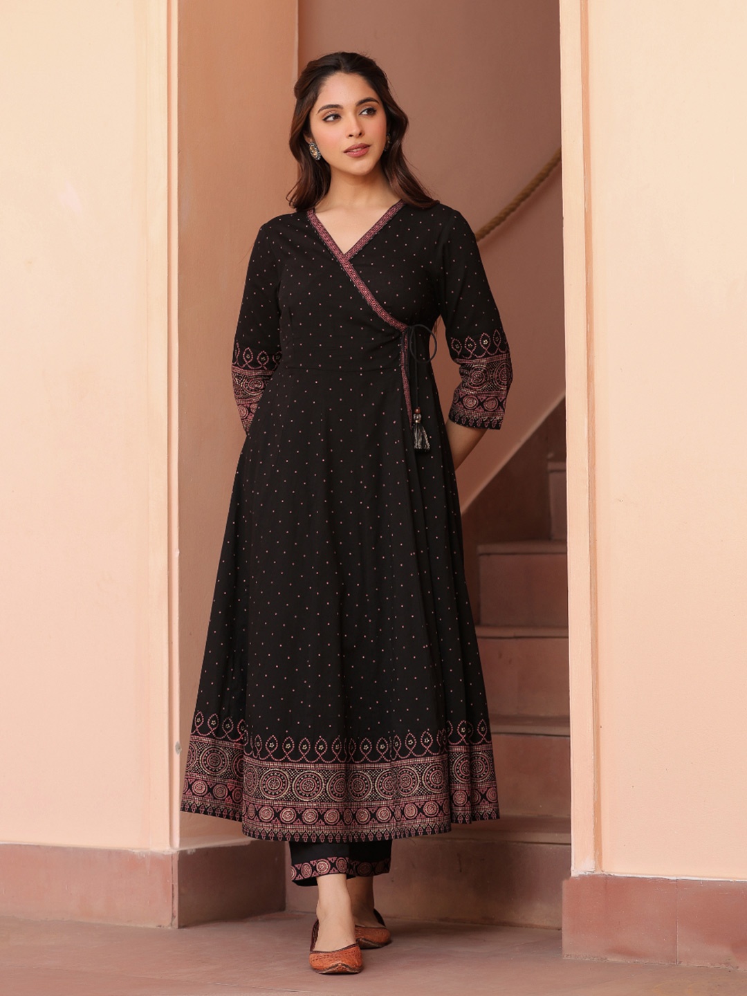 SAVI Ethnic Motifs Printed V-Neck Angrakha Pure Cotton Anarkali Kurta With Trouser, Black
SAVI Ethnic Motifs Printed V-Neck Angrakha Pure Cotton Anarkali Kurta With Trouser, Black