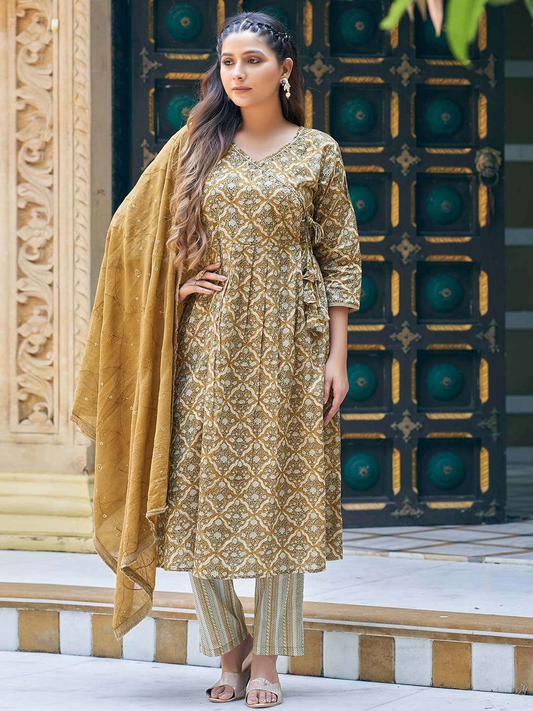 Peachmode Women Floral Printed Angrakha Sequinned Pure Cotton Kurta with Trousers & With Dupatta, Mustard
Peachmode Women Floral Printed Angrakha Sequinned Pure Cotton Kurta with Trousers & With Dupatta, Mustard