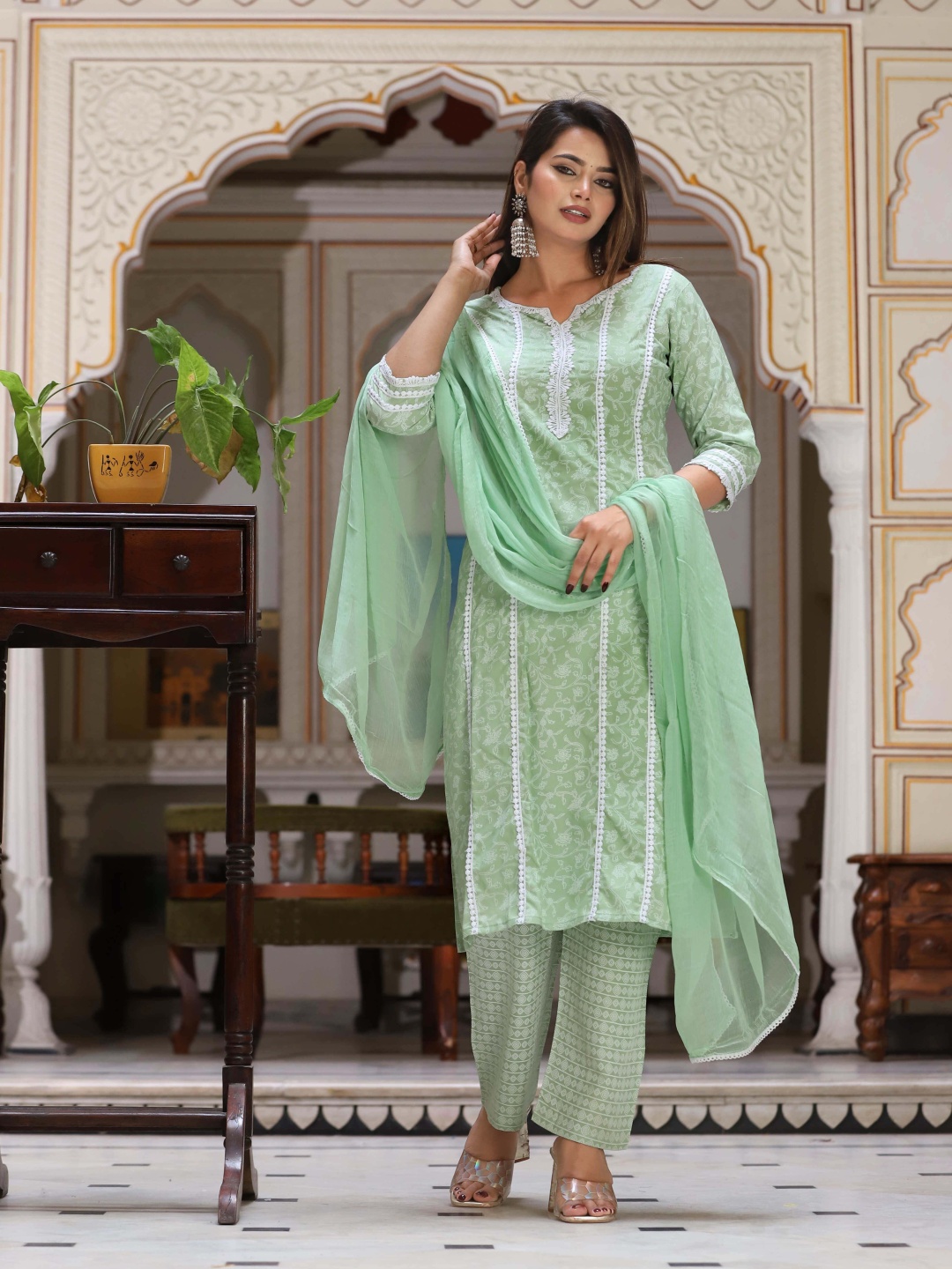 SINGNI Ethnic Motifs Printed Regular Thread Work Kurta with Trousers & Dupatta, Green
SINGNI Ethnic Motifs Printed Regular Thread Work Kurta with Trousers & Dupatta, Green