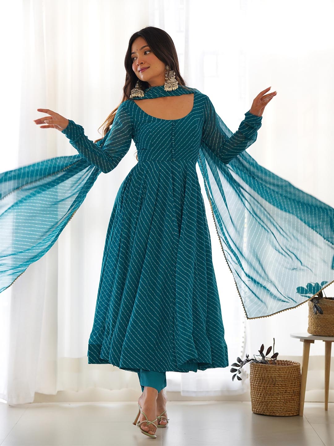 Tanhai Leheriya Printed Anarkali Georgette Kurta with Pyjamas & With Dupatta, Teal
Tanhai Leheriya Printed Anarkali Georgette Kurta with Pyjamas & With Dupatta, Teal