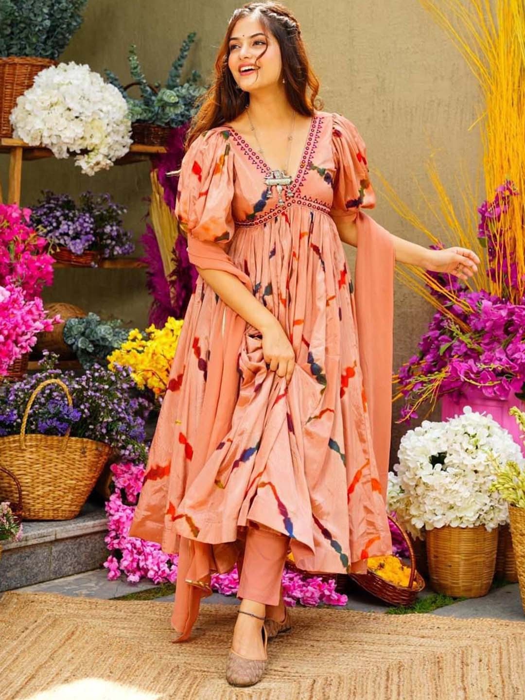 KALINI Women Floral Printed Empire Mirror Work Silk Chiffon Kurta with Trousers & With Dupatta, Peach
KALINI Women Floral Printed Empire Mirror Work Silk Chiffon Kurta with Trousers & With Dupatta, Peach